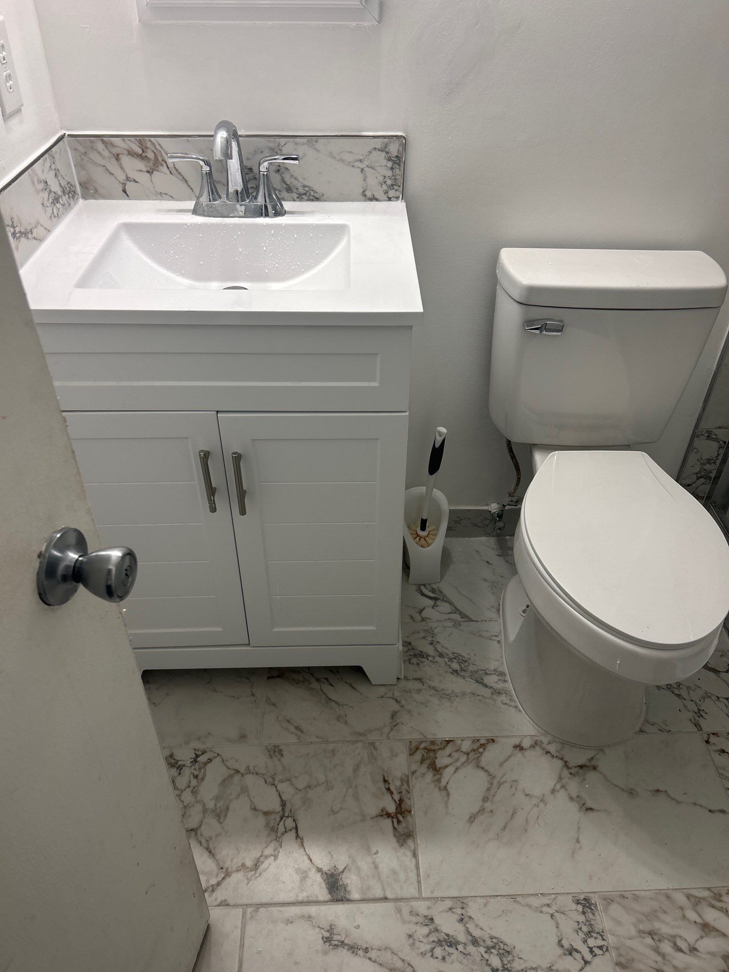 Dual Bathroom Makeover by urban green energy llc