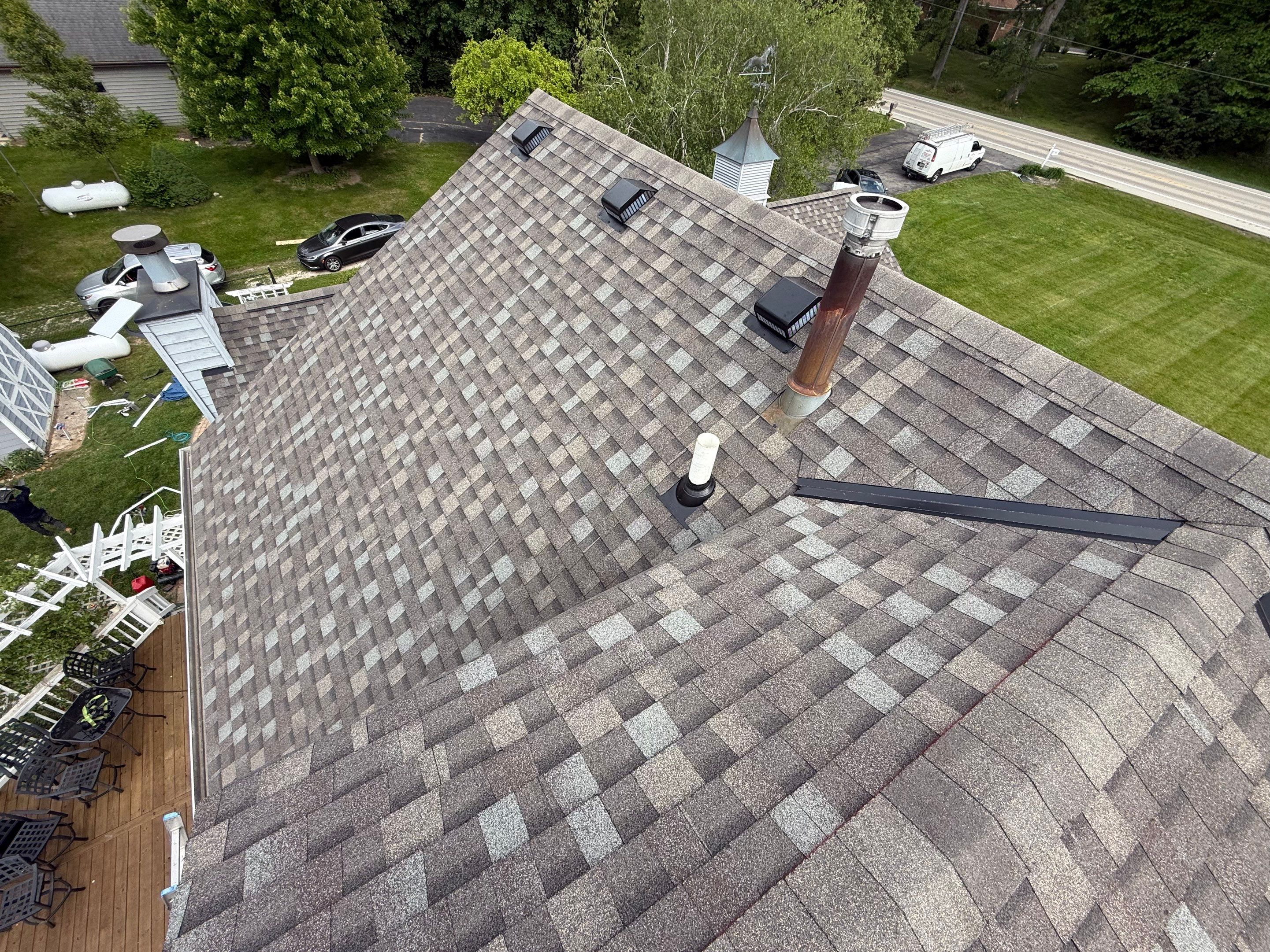 Roofing, copper chimney cap and copper awning by Optimal Home Improvement 