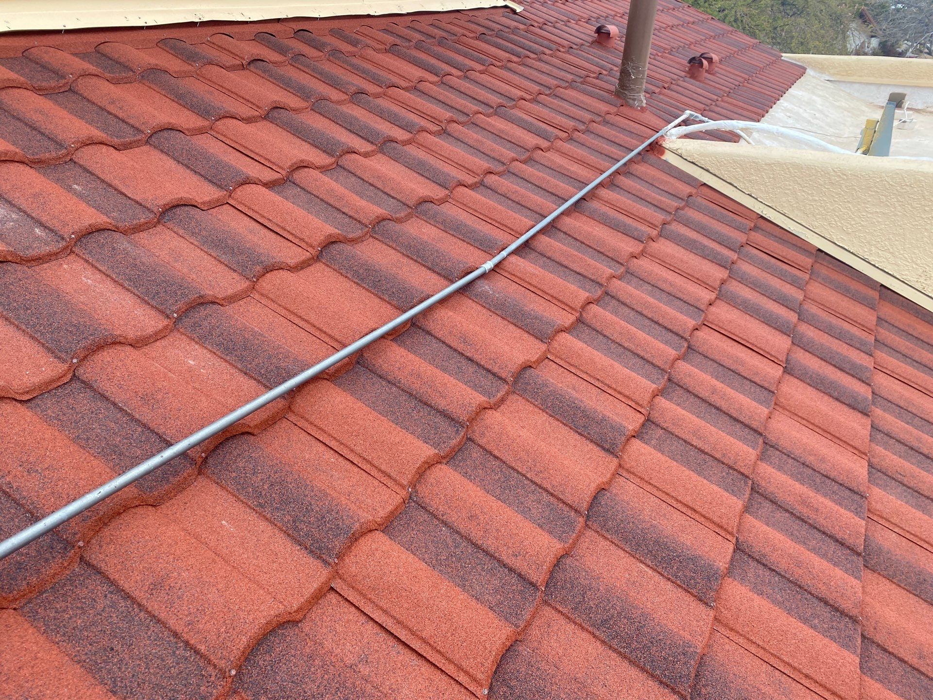 Terra Cotta Stone Coated Steel by Reimagine Roofing