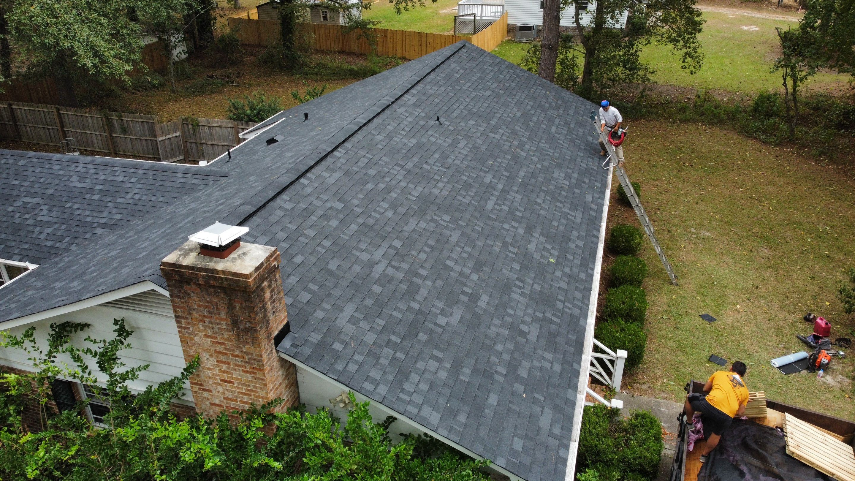 New Onyx Black Shingle Roof Replacement and Tree Damage Repair. by Midlands Roofing & Exteriors
