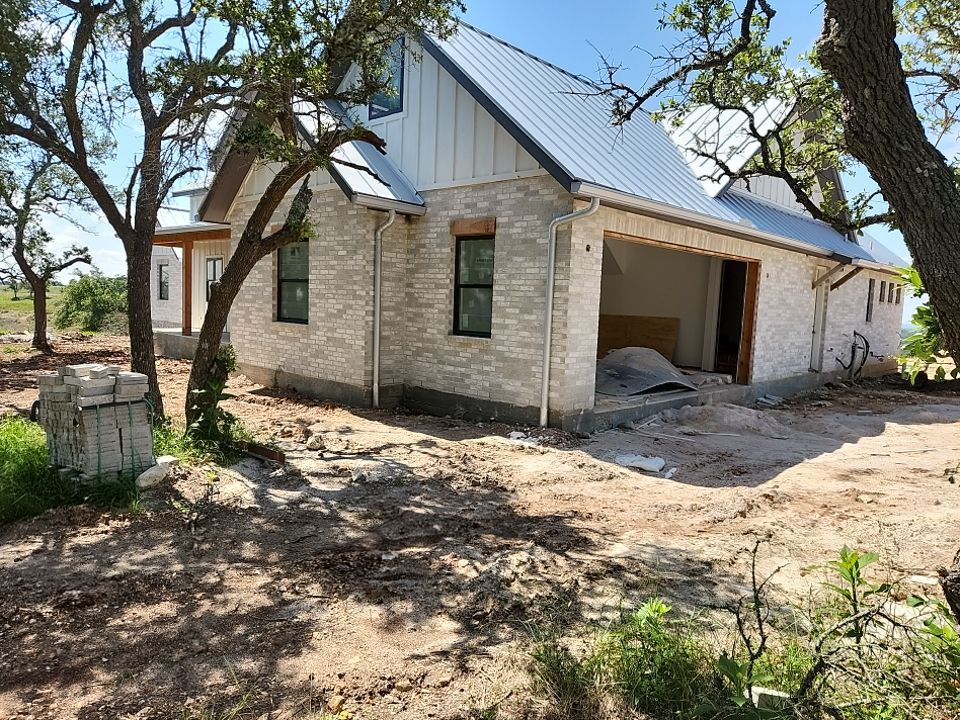 Residential Rainwater Collection System - Pioneer 40K gallon water tank in Mangrove Green by Hill Country Rain Water