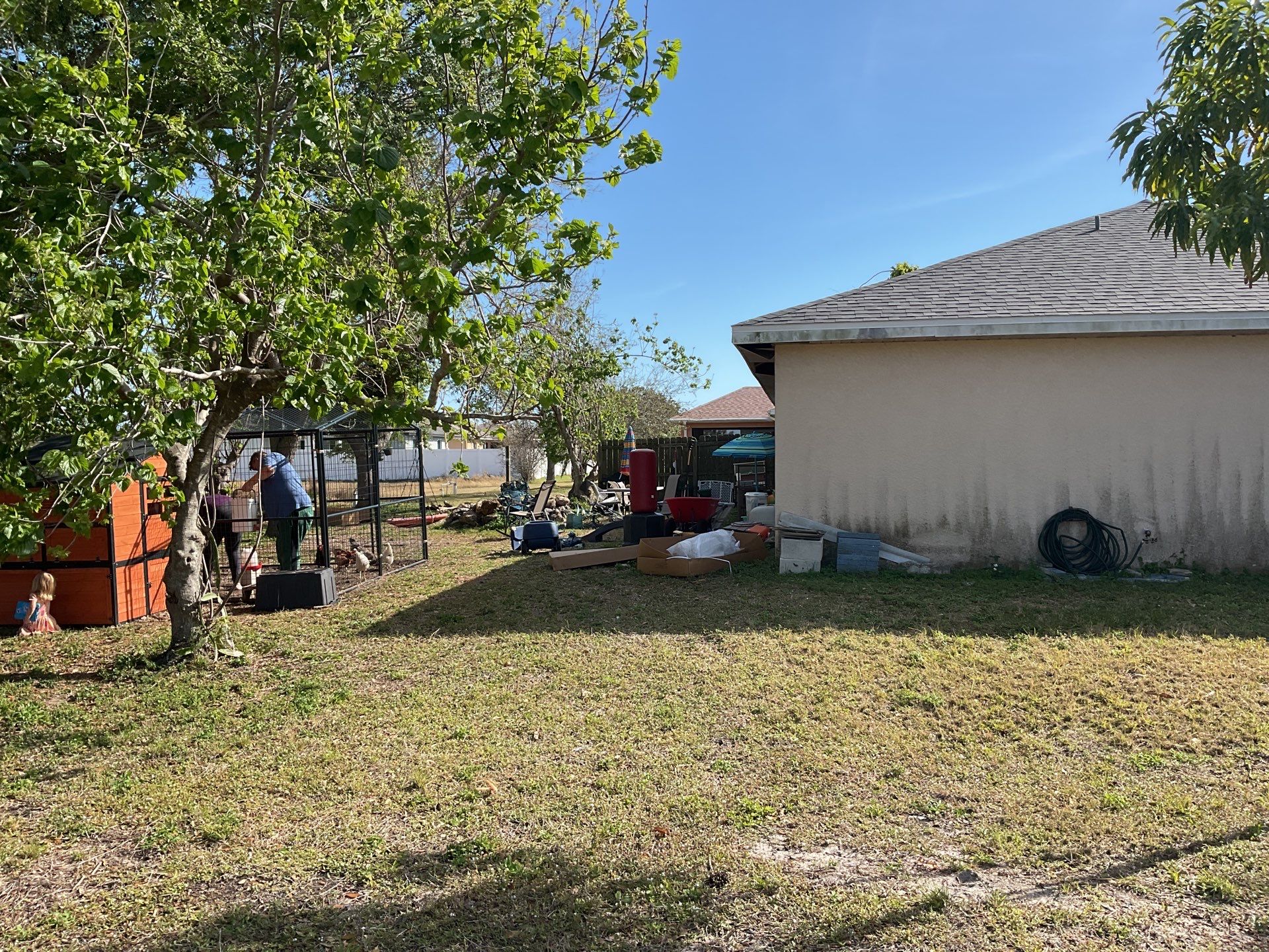 White Seamless Gutters and Soffit Installation in Cape Coral FL by Gutter Professors