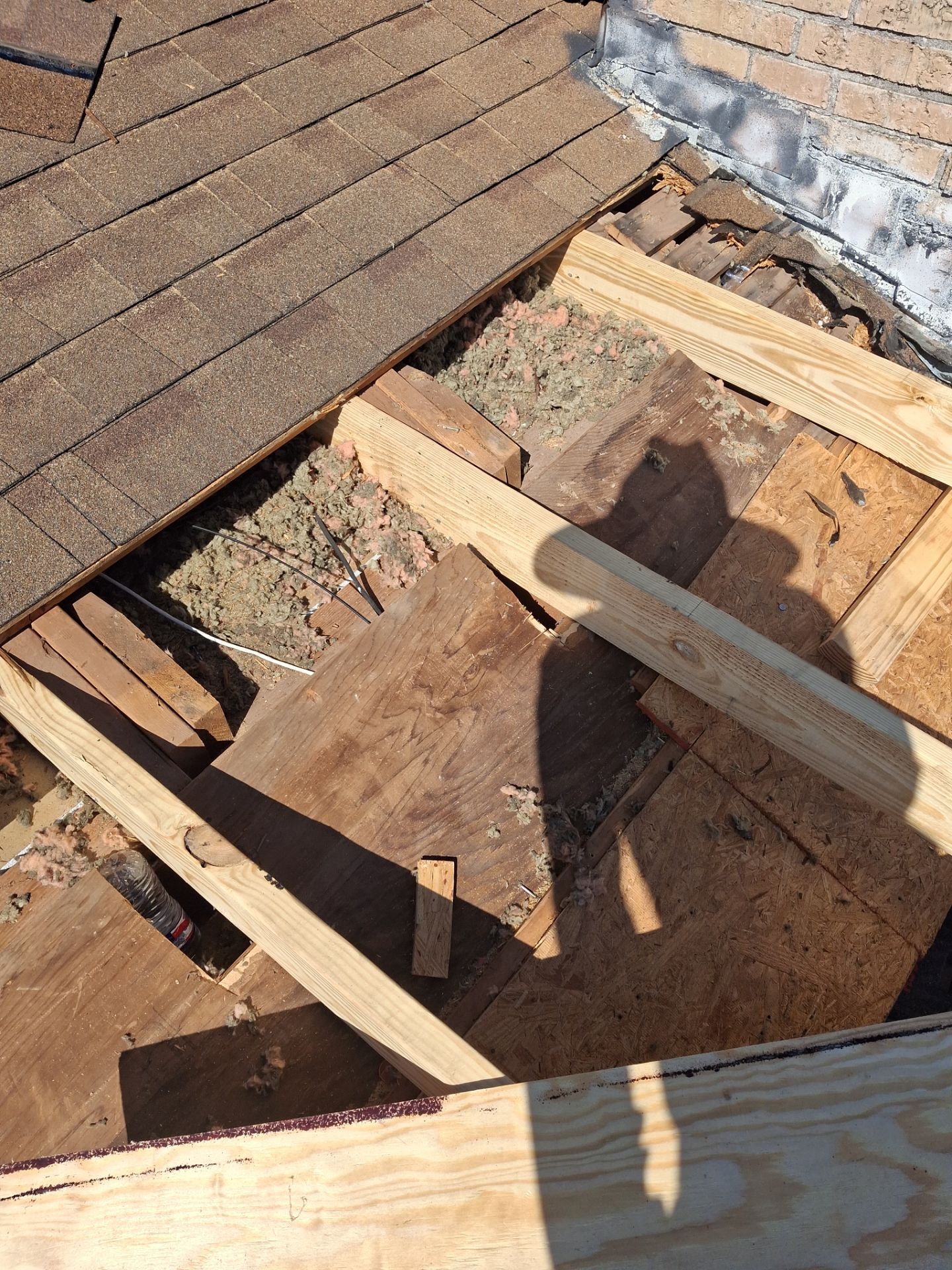 Chimneys need a Cricket.  by Bayfront Roofing and Construction