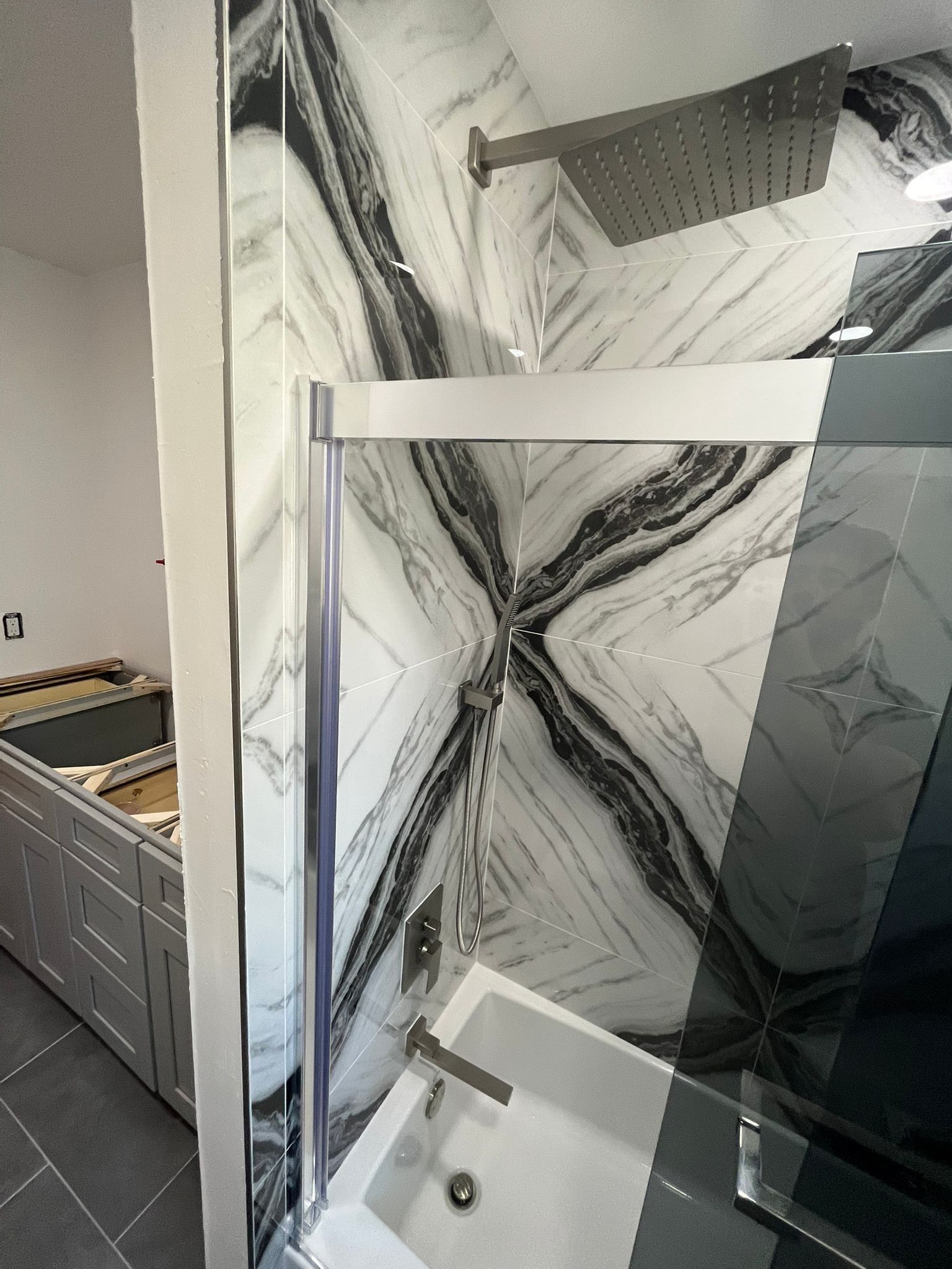 Bathroom Remodel using Tile by Home Concepts Construction