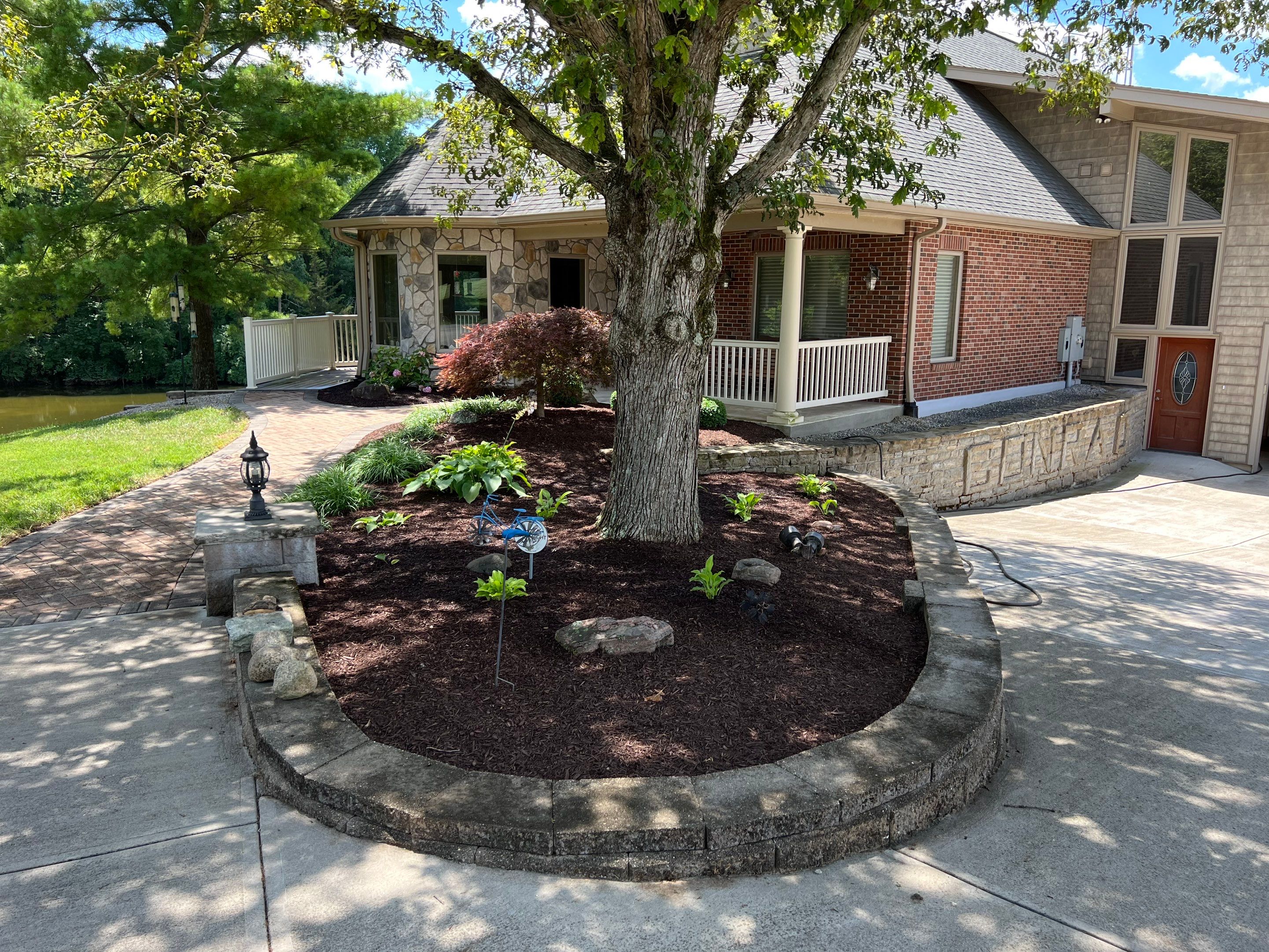 Tear Out, Plant Install & Mulch by Reisenberg’s Lawn & Landscape, LLC