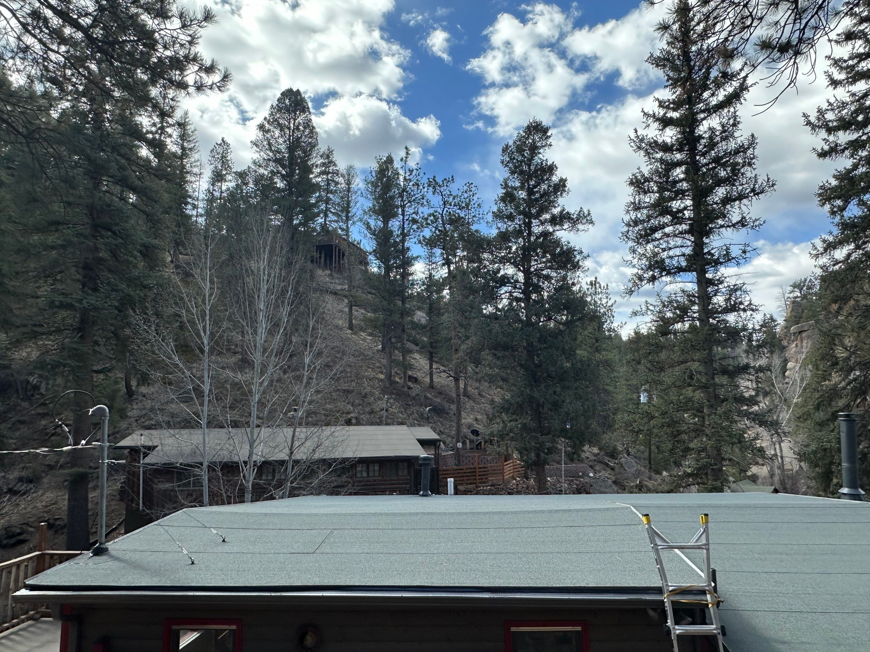 Residential Roofing Installation using Modified Bitumen Roofing by Blue Peaks Roofing LLC 