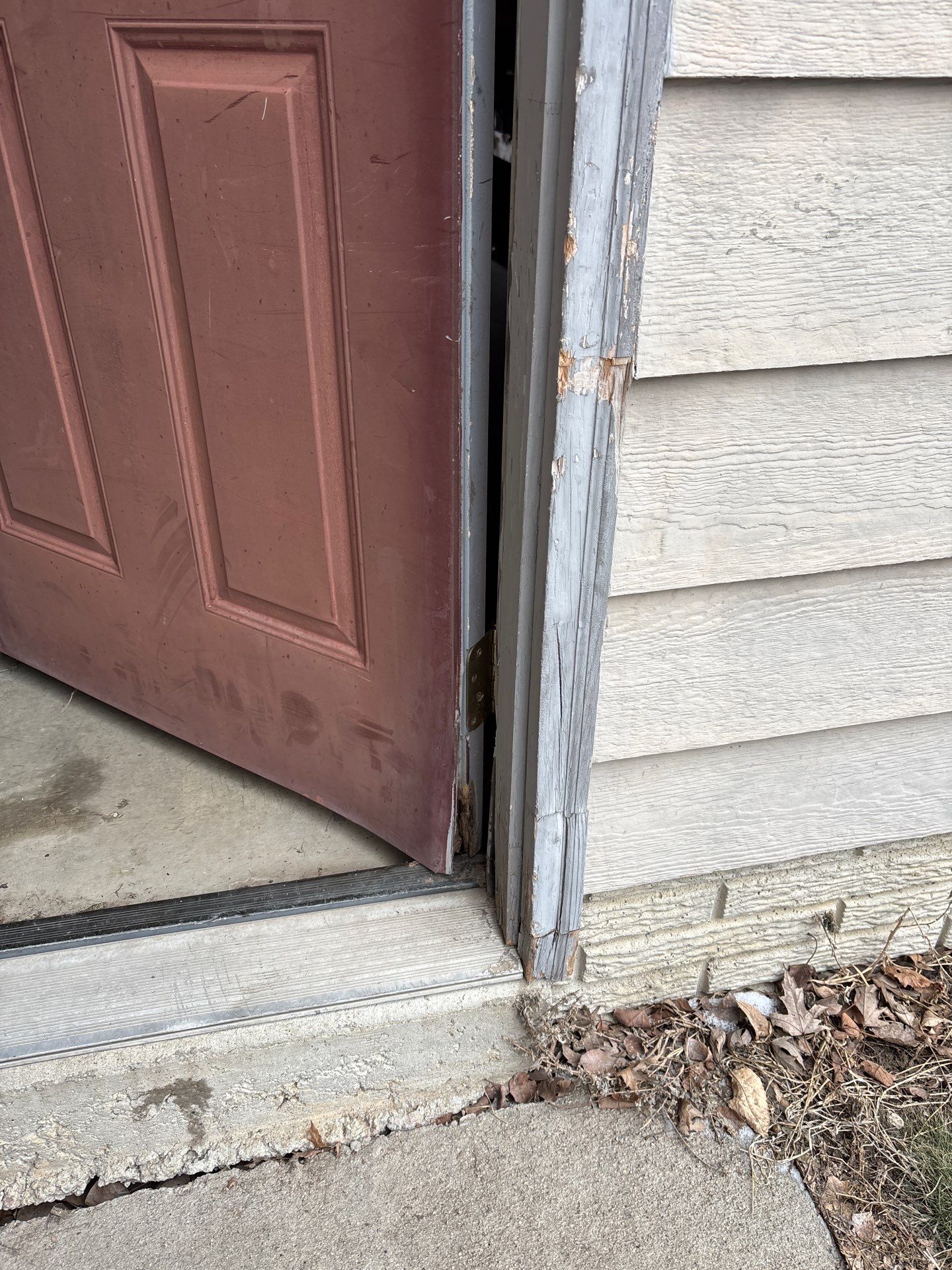 Exterior Painting and Wood Trim Replacement in Sioux Falls by Select Painting, Coatings & Garage Cabinets