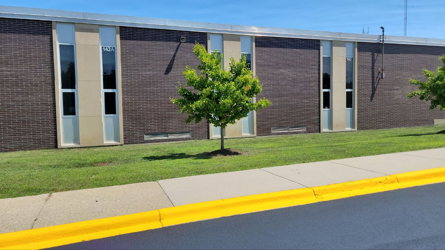 commercial pressure washing using Algaecide, soft wash soap by Northern Power Washing LLC.