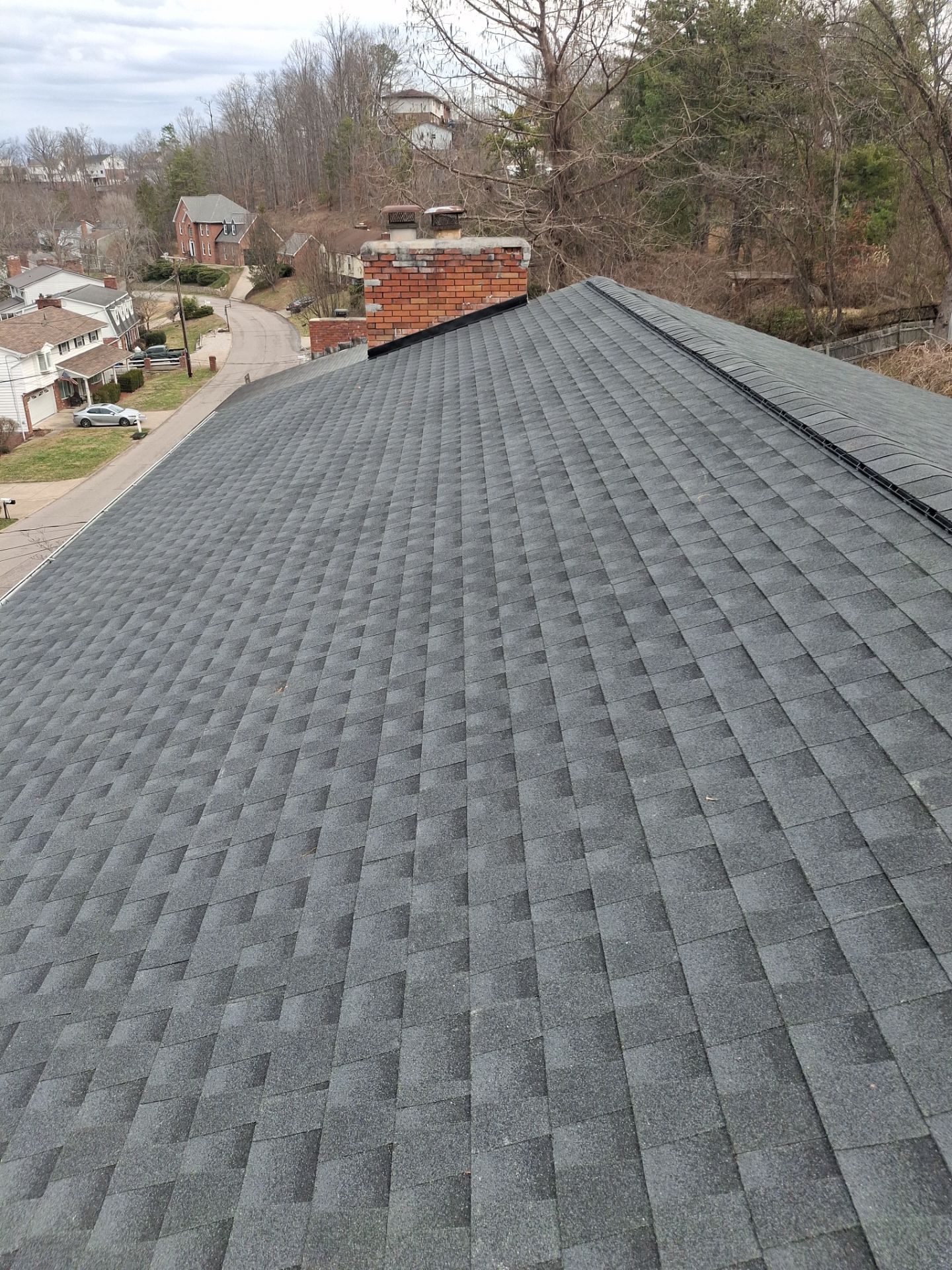 Residential Roofing Installation using GAF Timberline HDZ Charcoal by Rainstoppers Roofing