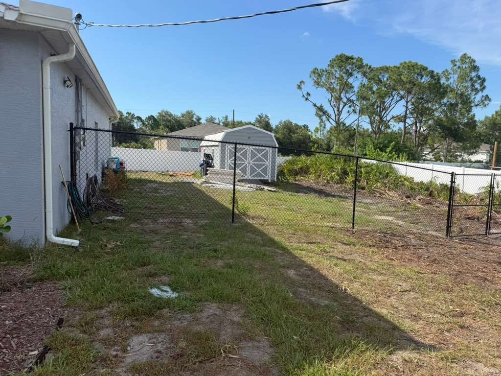 Black Chain Link and Vinyl Privacy Fence Installation in North Port by True Fence LLC