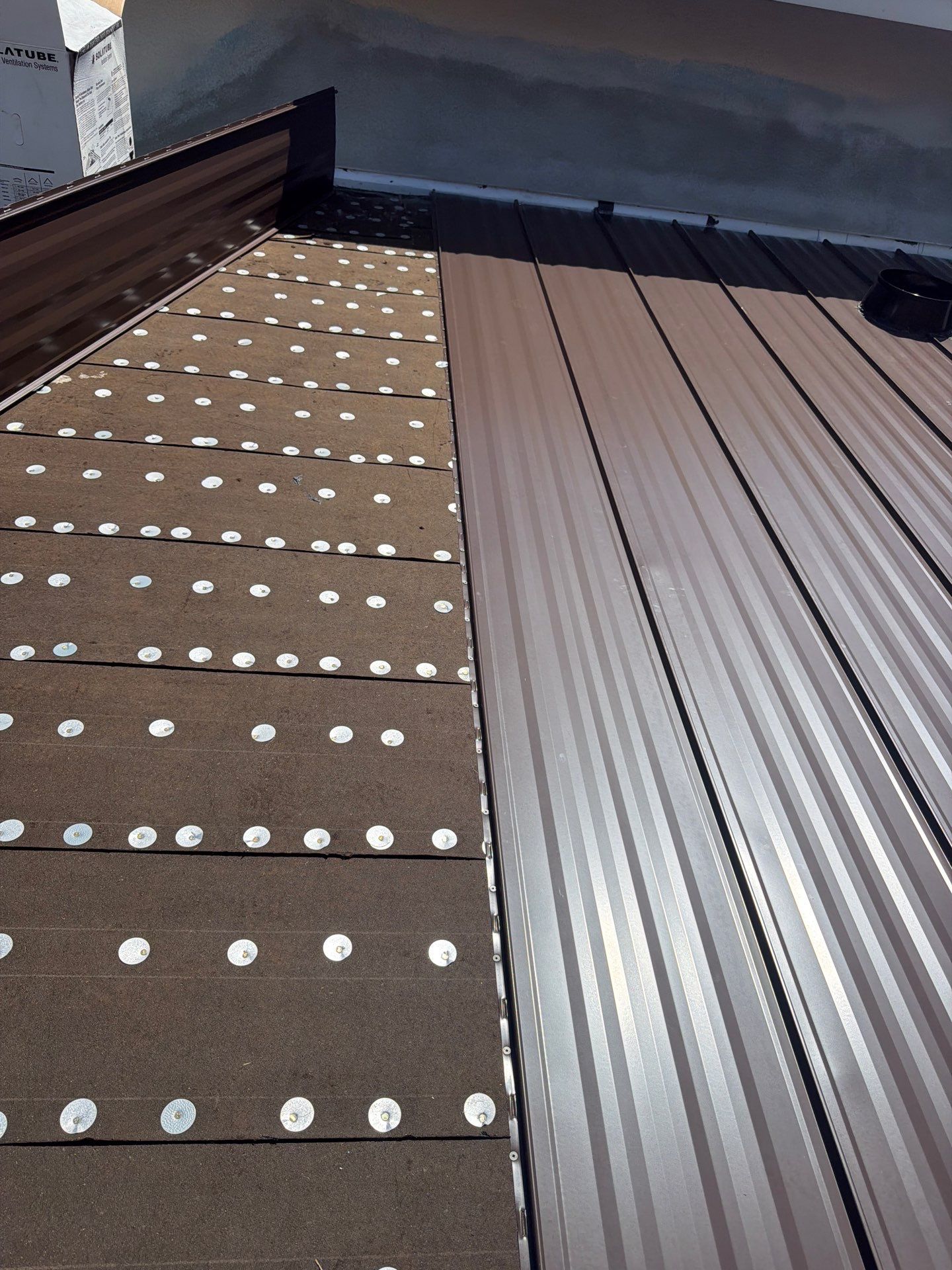 Residential Roofing Installation using 1" Nail strip metal roof by BLUES BROTHERS ROOFING