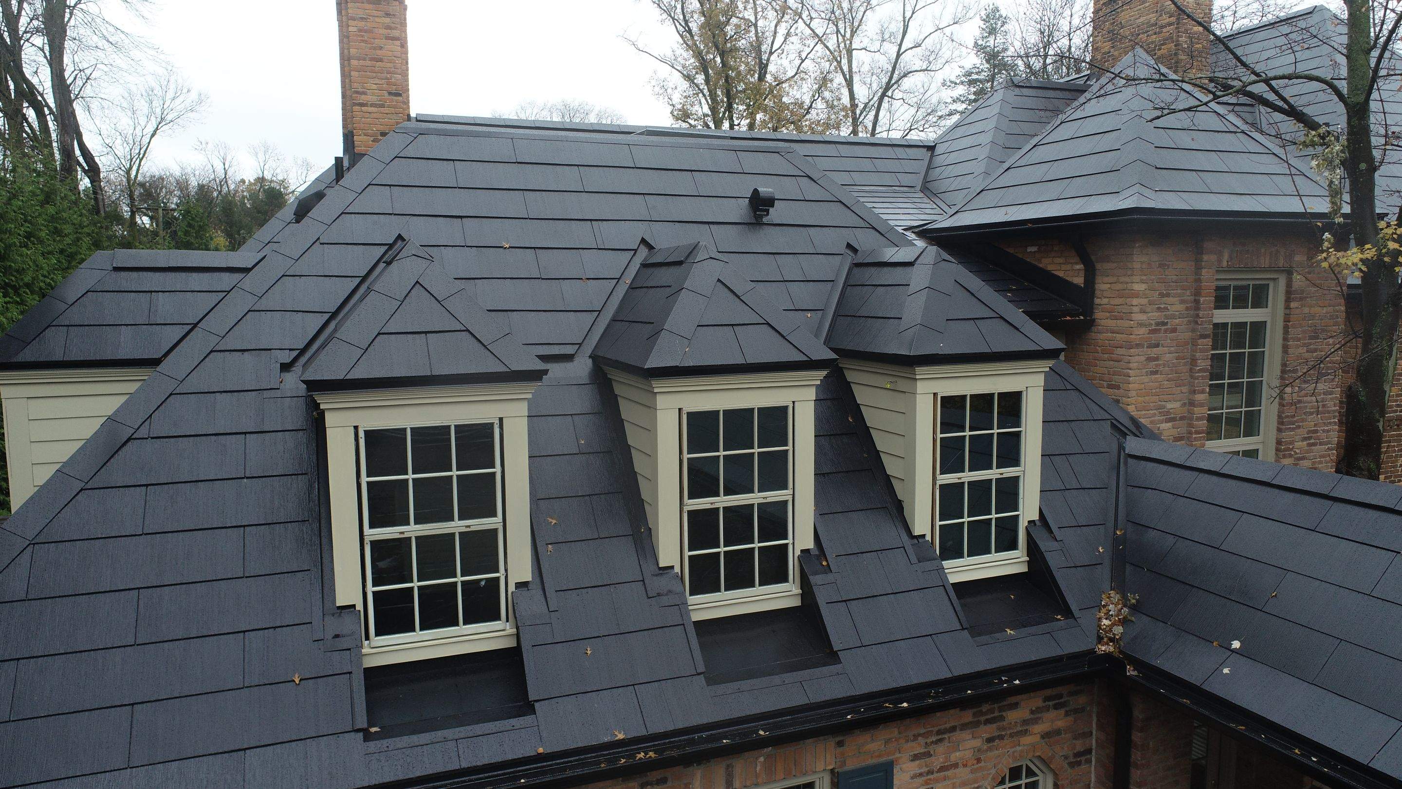 Tesla Solar Roof Replacement  by American Home Contractors