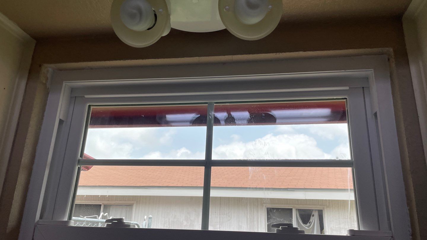 Black and white and red all over by Bayfront Roofing and Construction