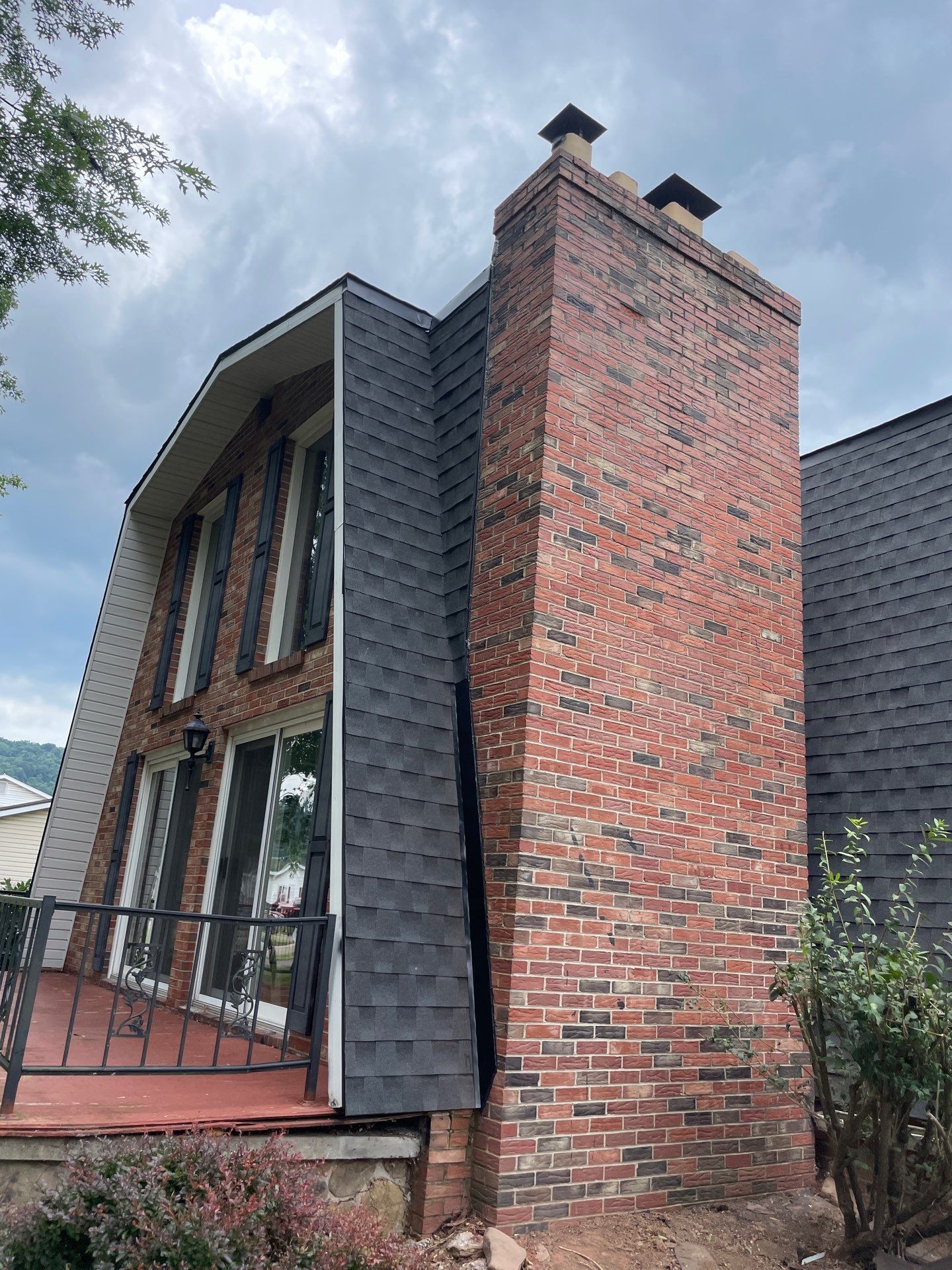 Residential Roofing Installation using GAF Timberline HDZ Charcoal by Rainstoppers Roofing