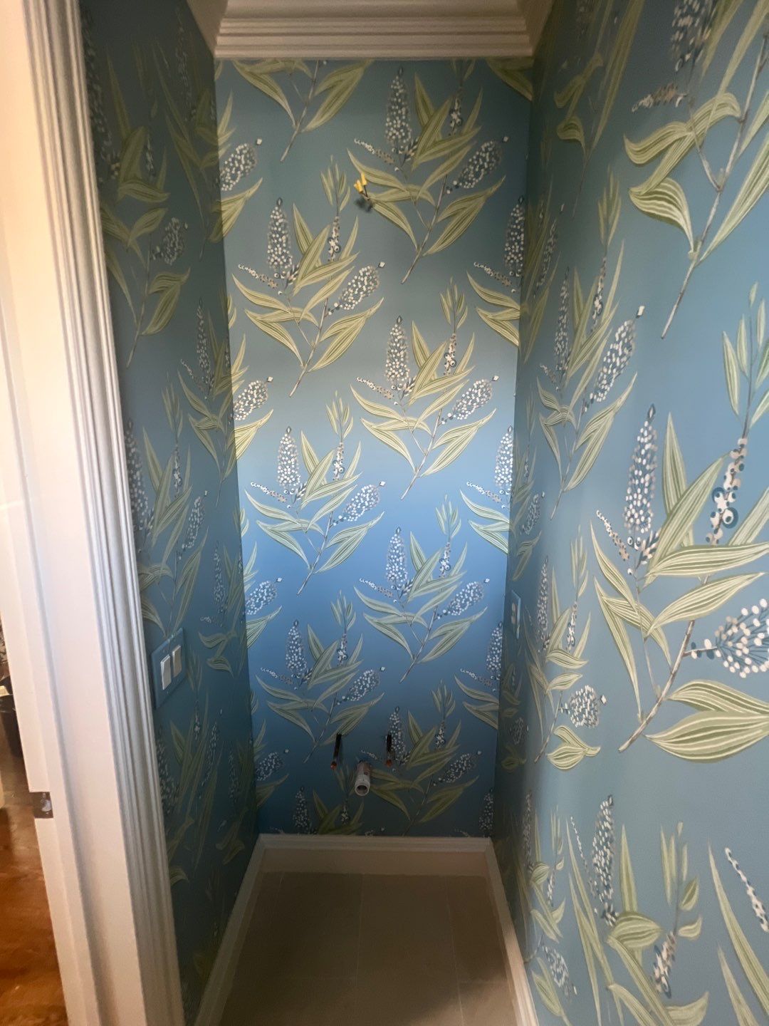 Wallpaper Installation in the Bathroom by Nomad Painting