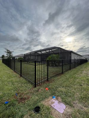 Aluminum Fence Installation using Black 3 Rail Aluminum Fence