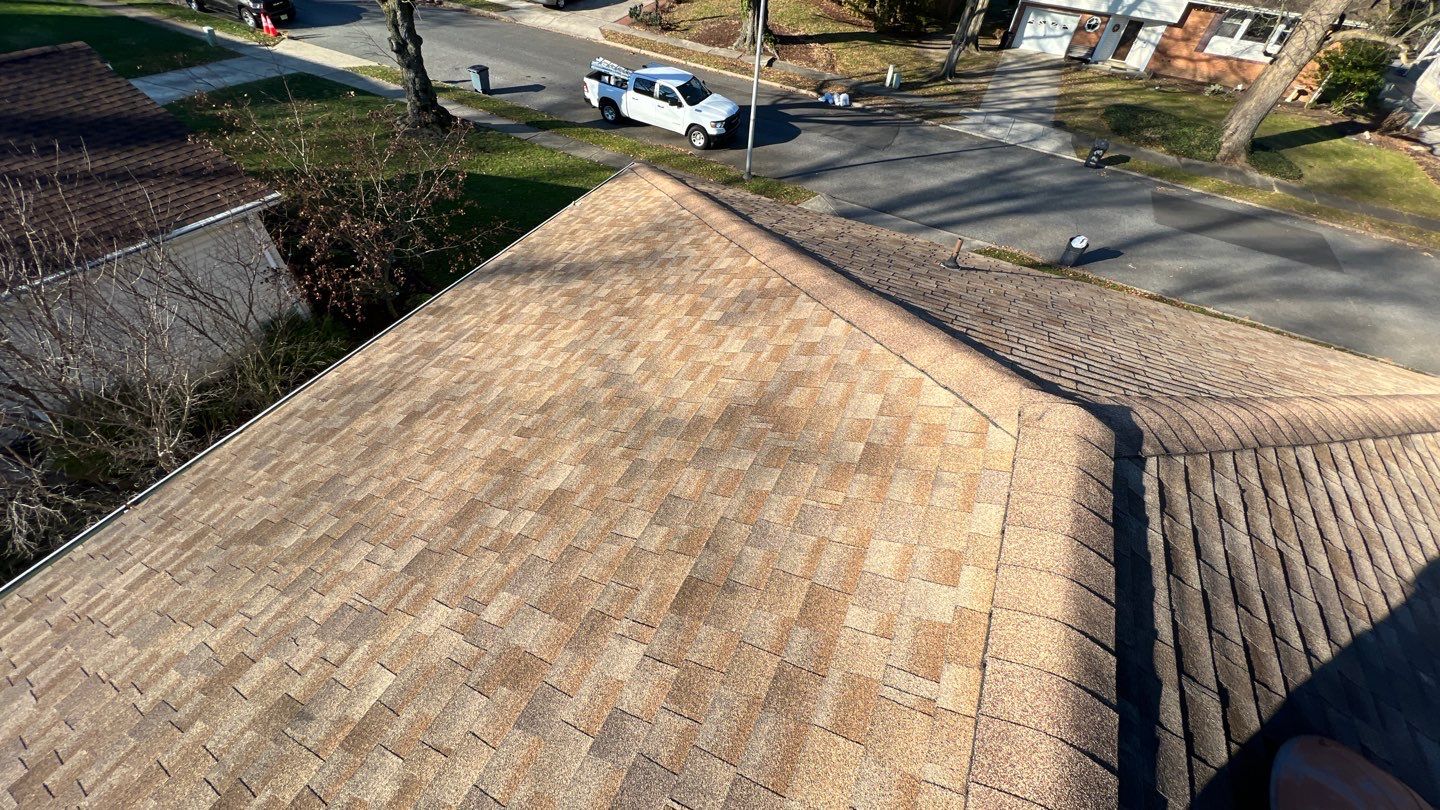 Onyx Black Shingles by Reimagine Roofing