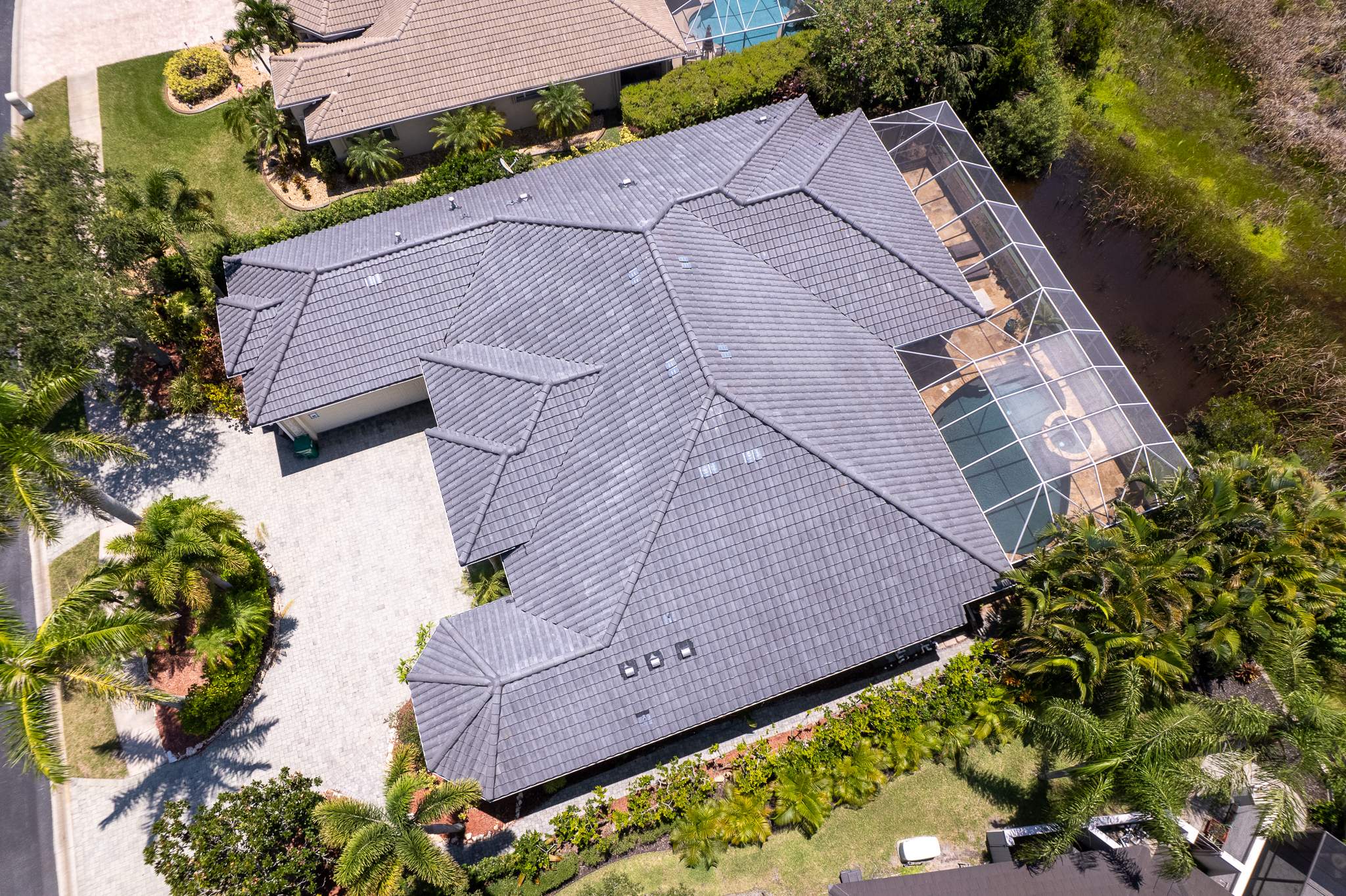 Residential Tile Roof Replacement with Skylight Integration in Melbourne by Wiedmann Construction & Roofing