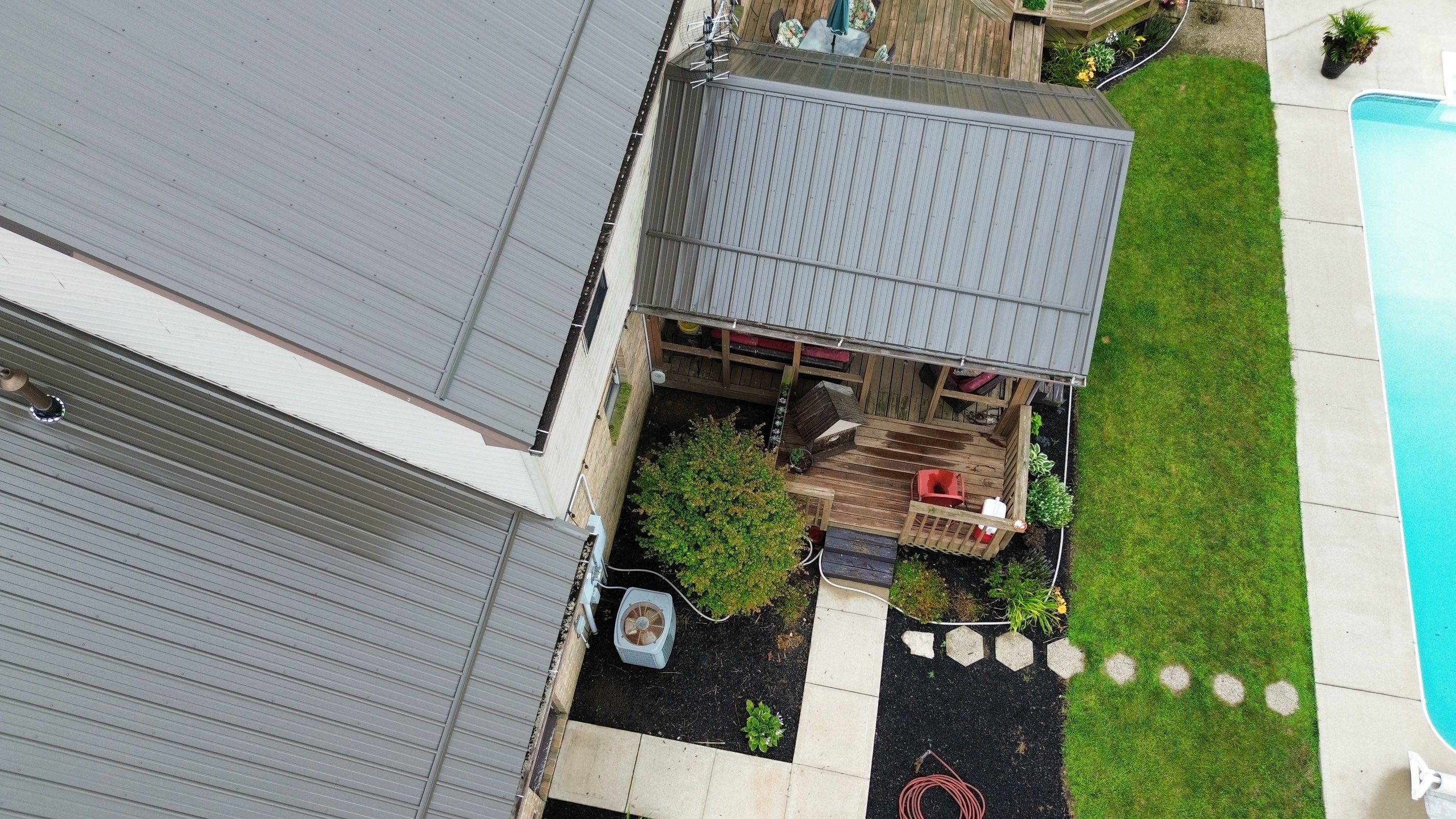 Residential Roofing Installation using Performance Panel Metal - Burnished Slate by RoofX 