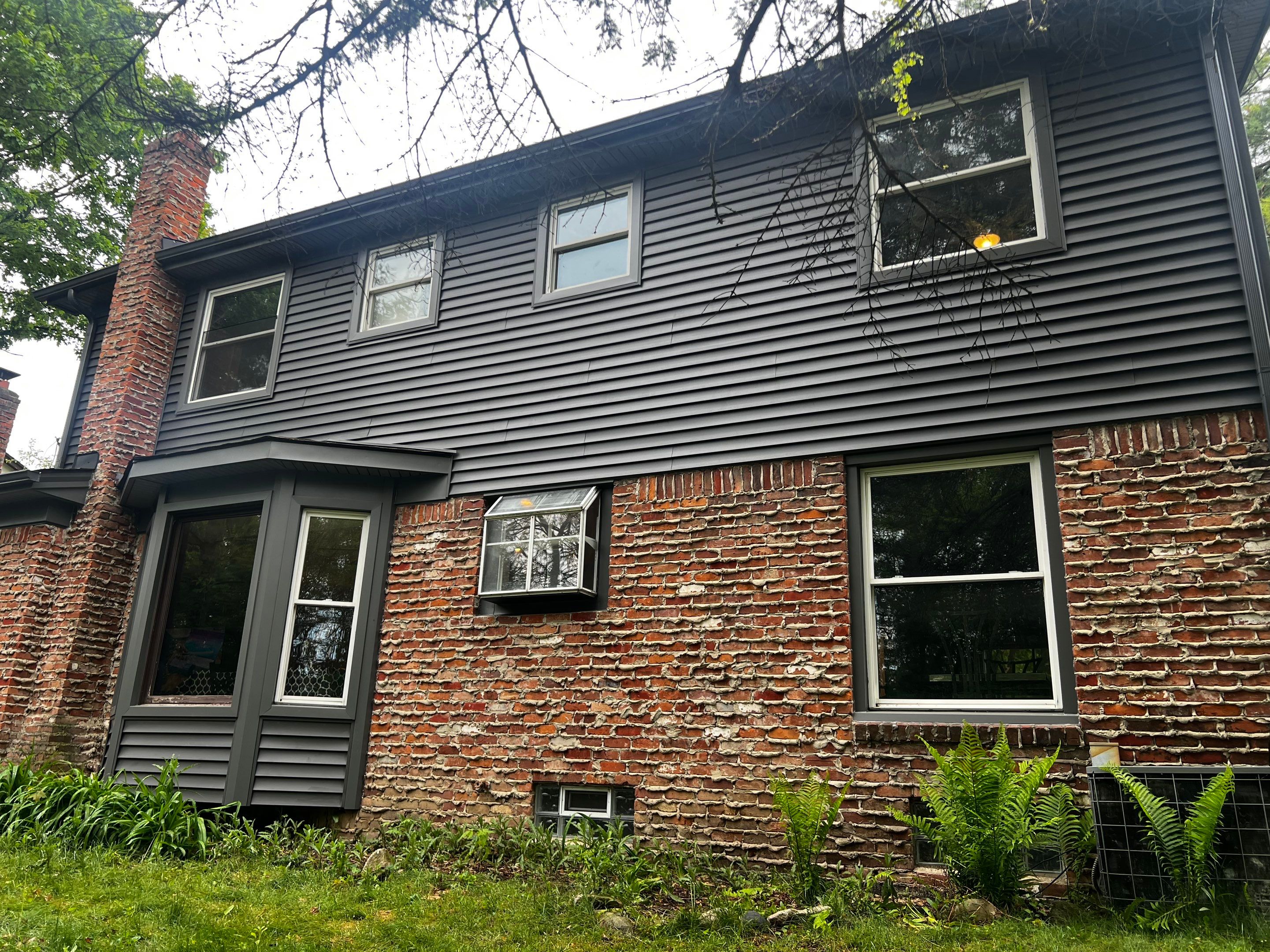 Siding Replacement  using Certainteed Monogram Vinyl D4" Smoky Gray color by Bloomfield Construction & Restoration