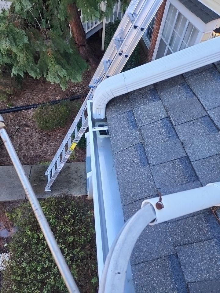 Gutter Cleaning using water by Power Wash Masters LLC