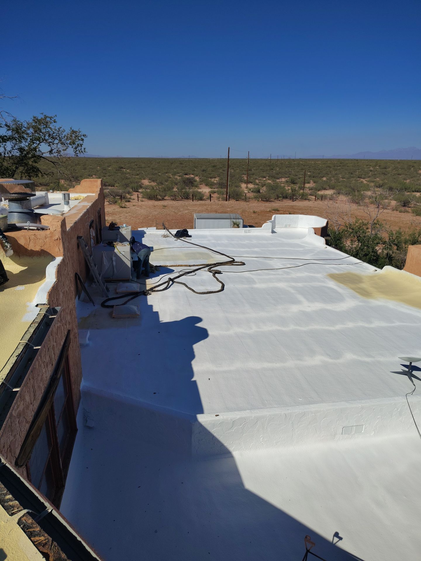 Residential roof application by SPF Services 