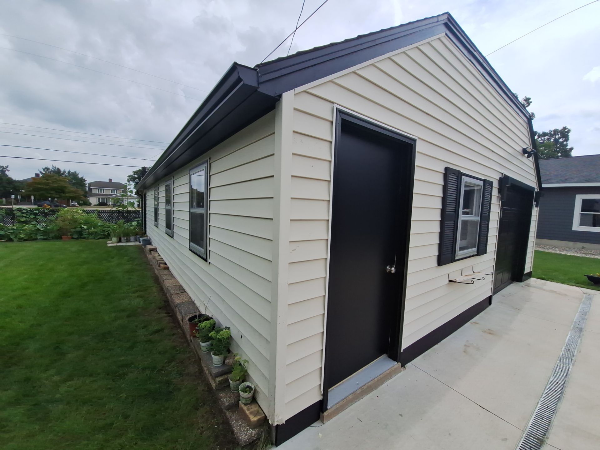 Epoxy Flake Garage Floor & Foundation Refresh – Seamless, Durable, and Clean Finish by Gordon Painting