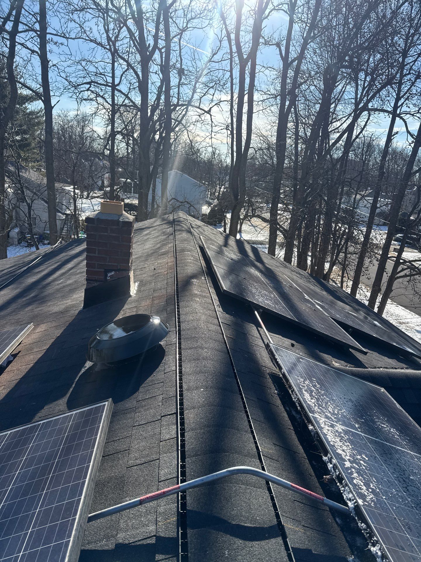 Onyx Black Shingles by Reimagine Roofing