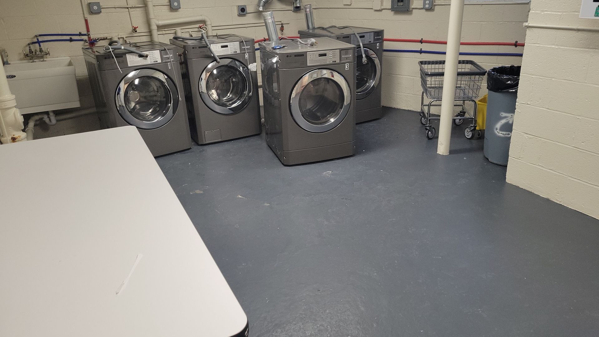 Laundry Room Floor Coating using Penntek by Spectrum Painting, LLC