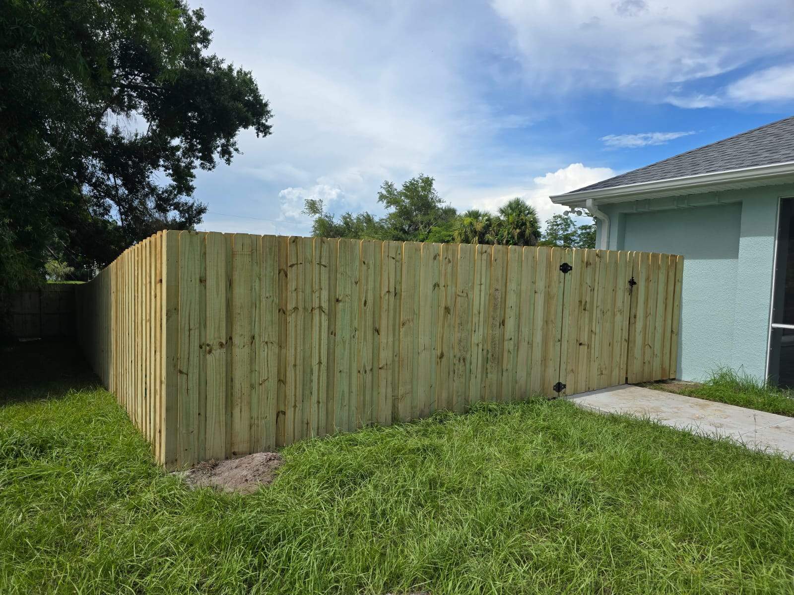 Custom Wood Privacy Fence and Gate Installation in Punta Gorda by True Fence LLC