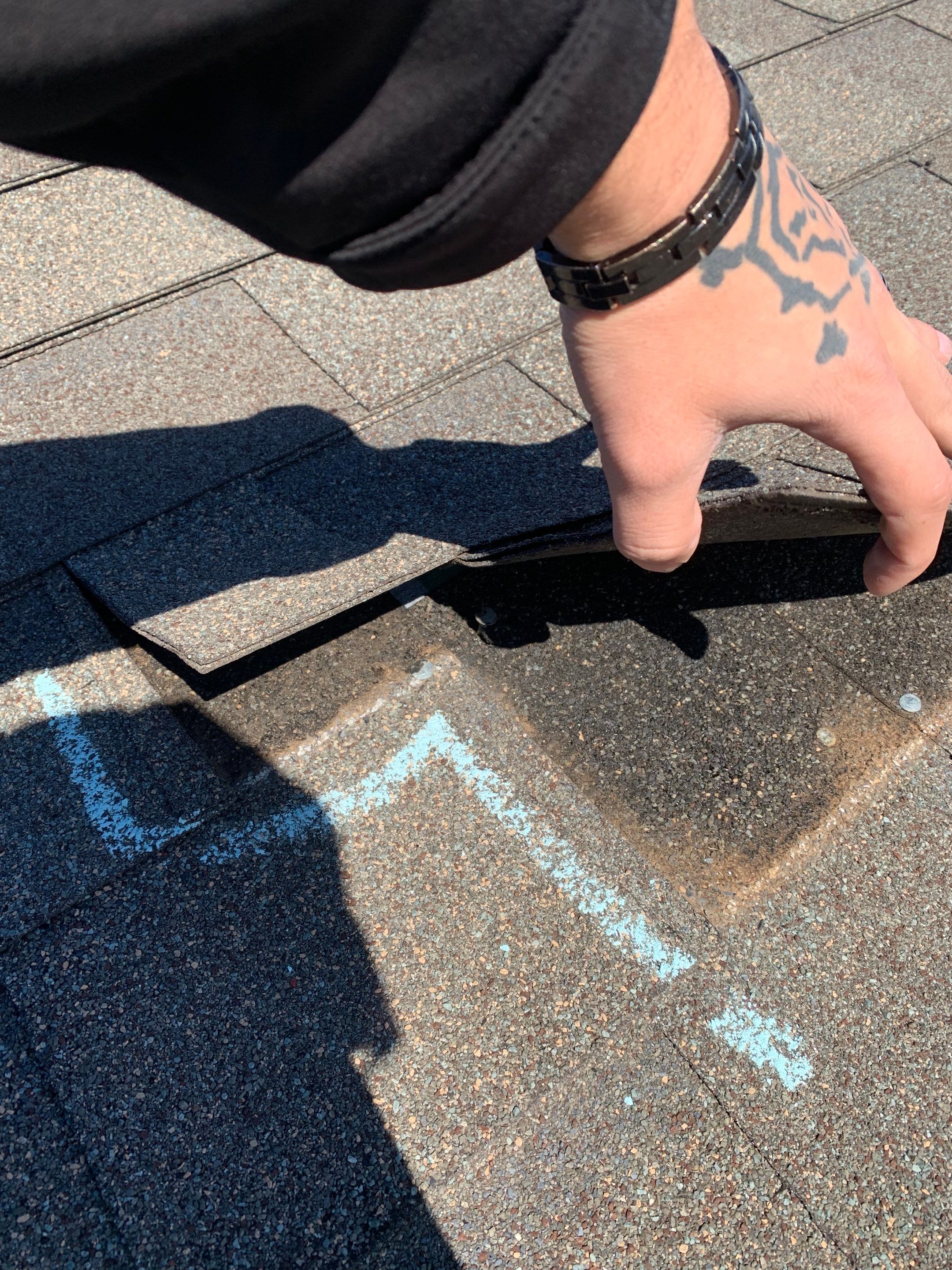 roof inspection in Enid by McCann's Roofing and Construction