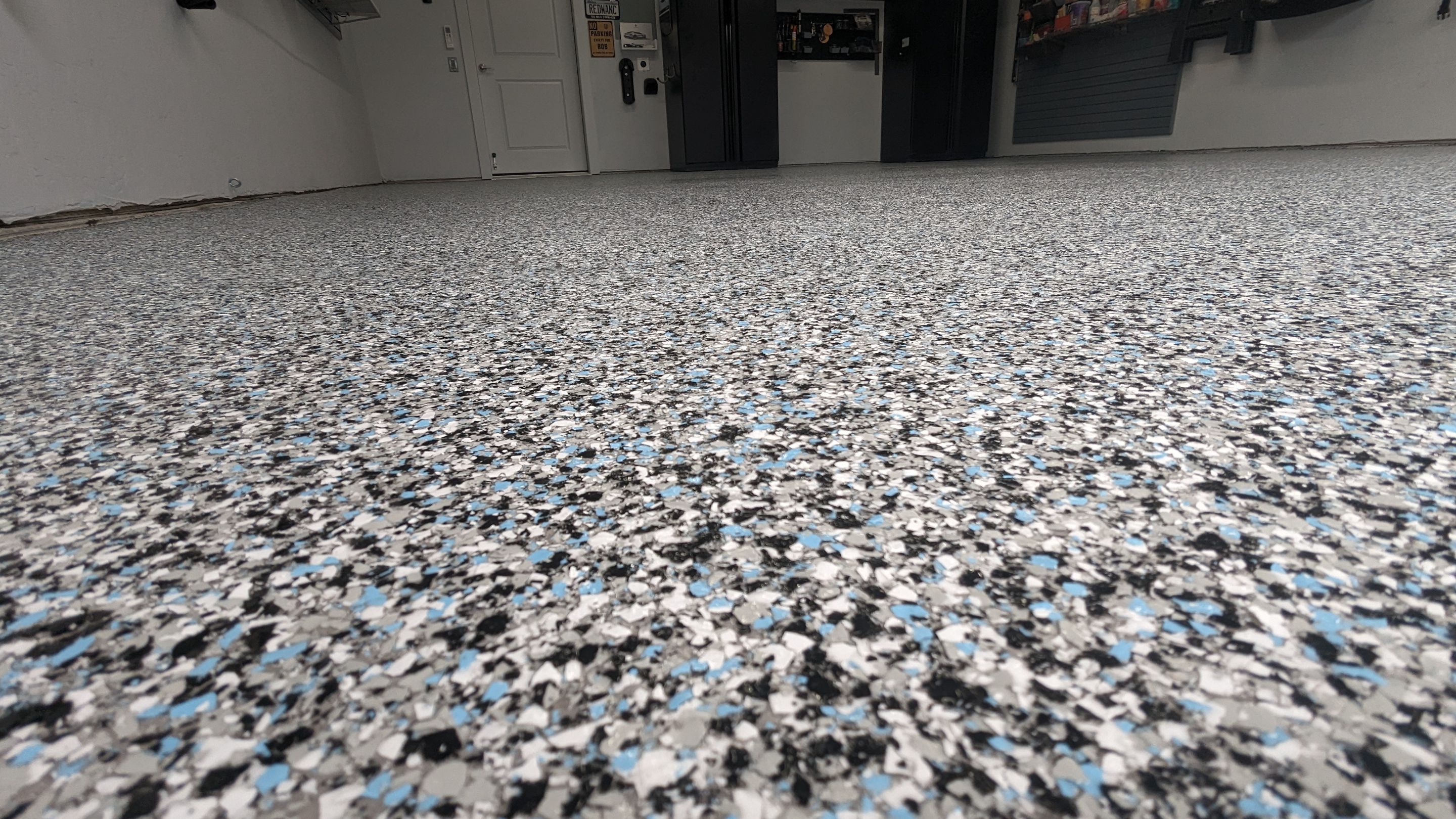 Garage Transformation using Custom domino w/ baby blue by Croc Coatings, LLC
