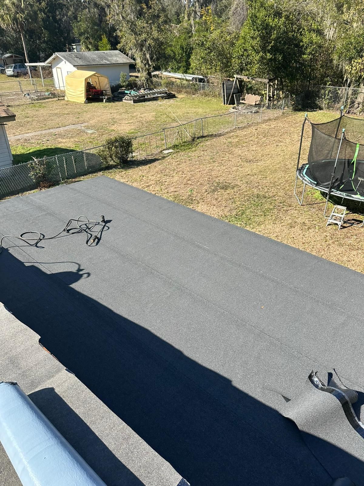 Flat Roof Renovation Due to Water Accumulation by urban green energy llc