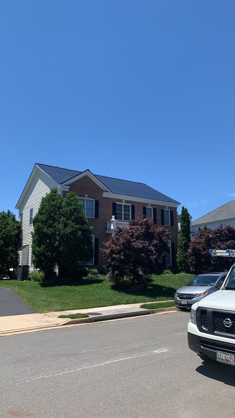 Tesla Solar Roof Replacement using Tesla Solar Roof V3 tiles by American Home Contractors