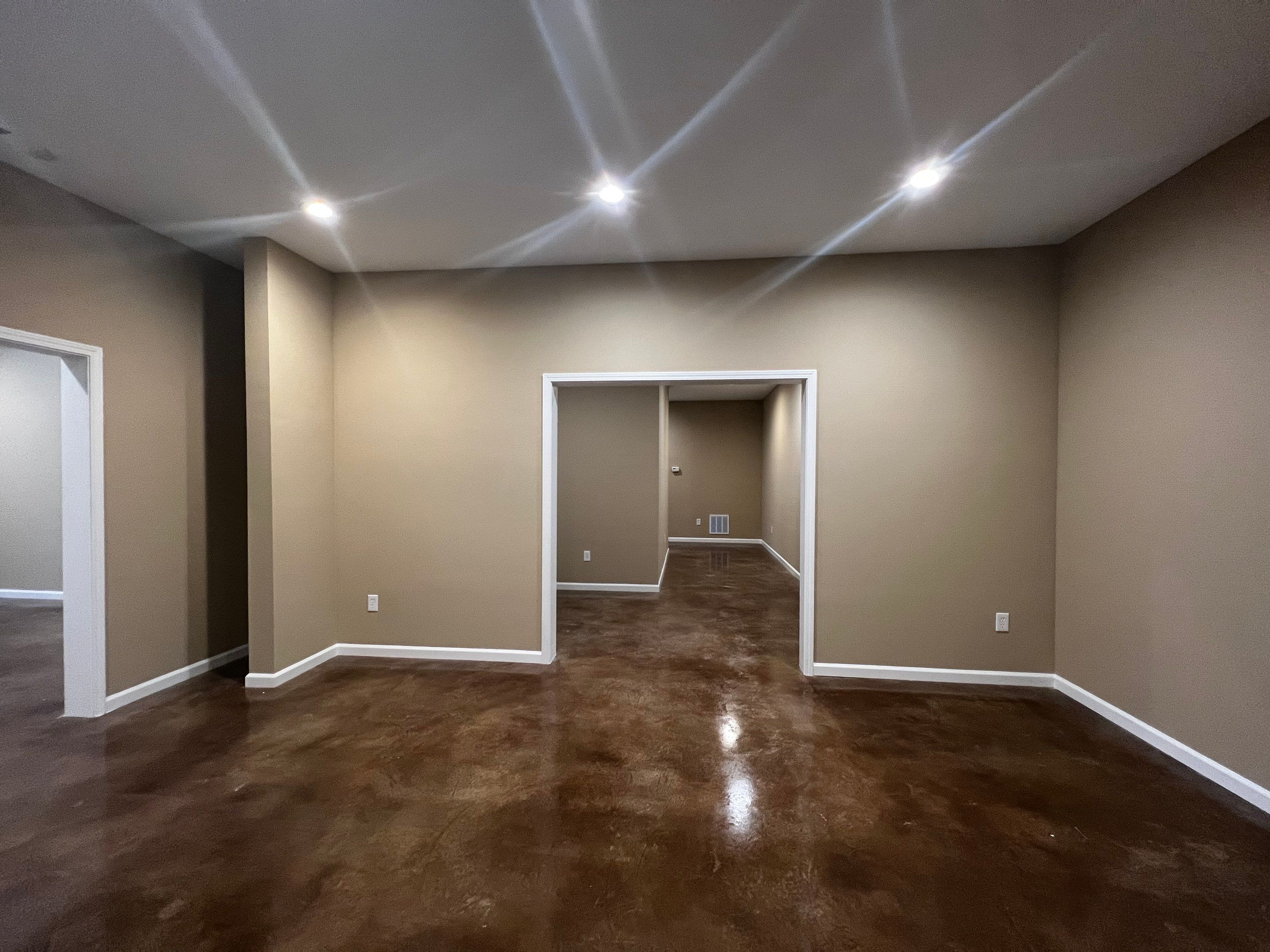 Finished Basement Renovation Featuring Polished Concrete in Atlanta by Swift Home Renovations