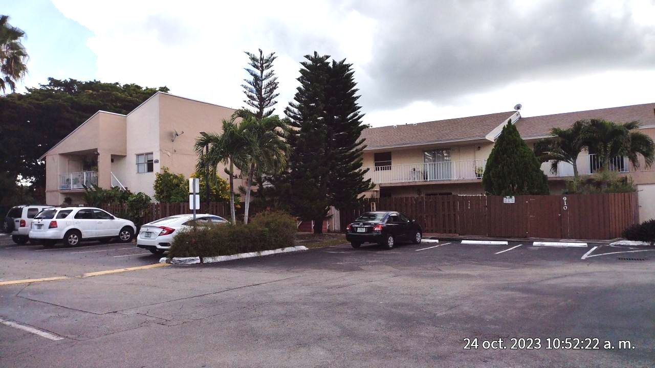 LAKE AND TENNIS VILLAS CONDO BLDG 8480 by Souffront Construction & Engineering