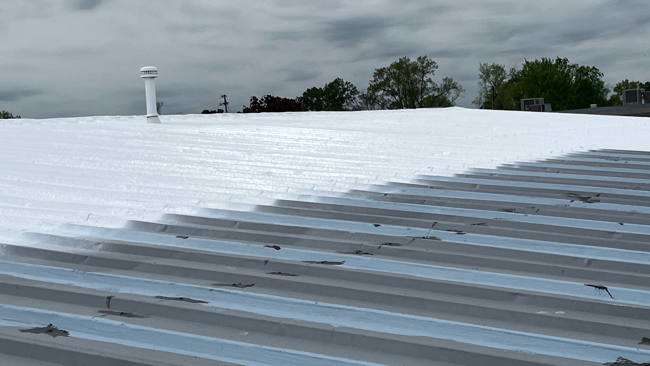 Berea Ohio Metal Roof Coating by Gold Star Roofing LLC 