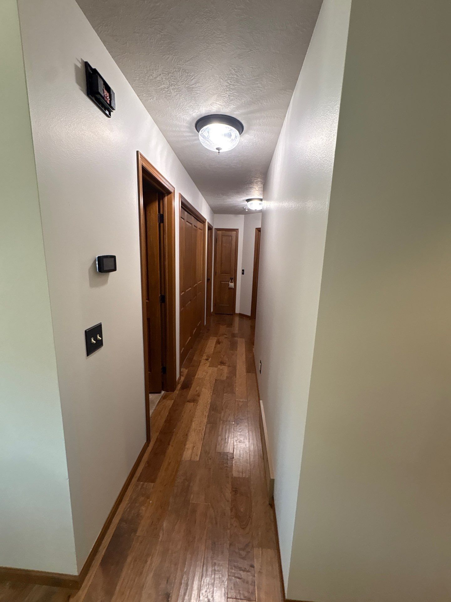 Interior Home Painting and Custom Door Updates in Sioux Falls by Select Painting, Coatings & Garage Cabinets
