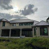 24ga 1.5" Mechanical Seam Dark Bronze by Total Roofing System The Metal Roof Experts