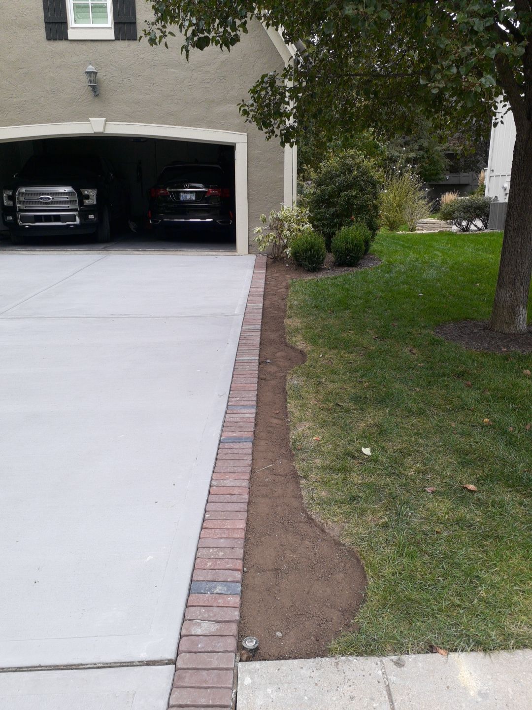 New Driveway and Sidewalk by LAND ESCAPES LLC