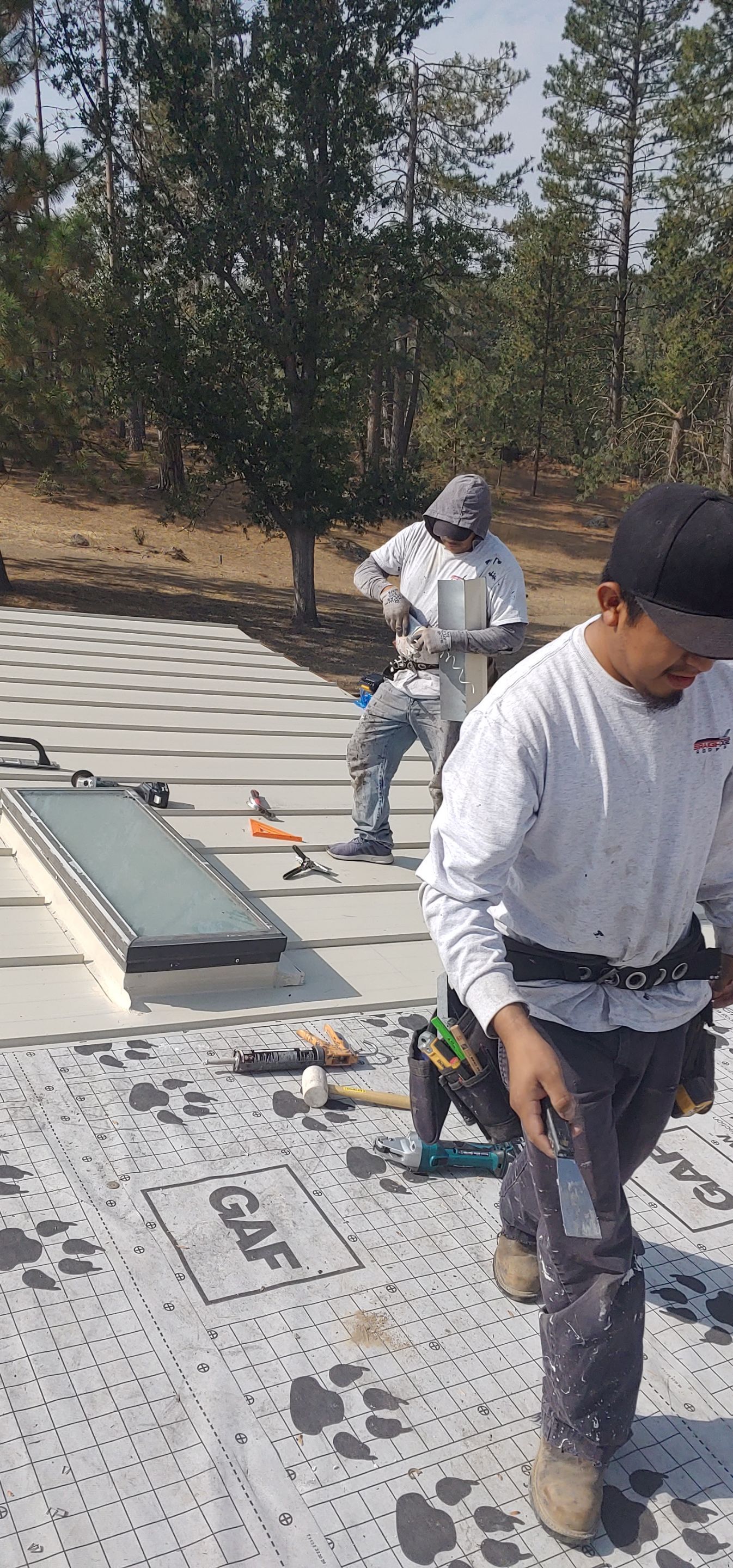 Residential Roofing Installation using Standing seam metal roofing system by Straight Edge Roofing Inc