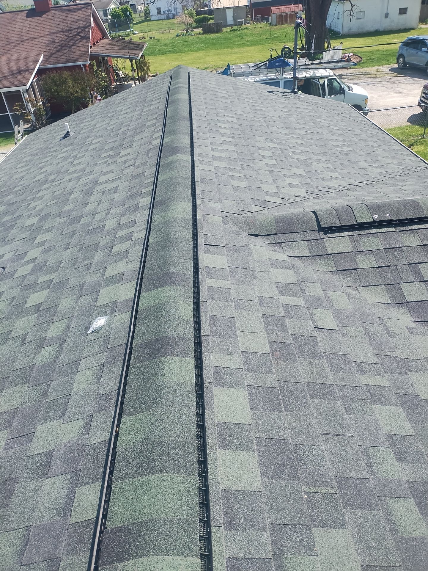 Residential Roofing Installation using Performance Shingles by Mr. Roofer