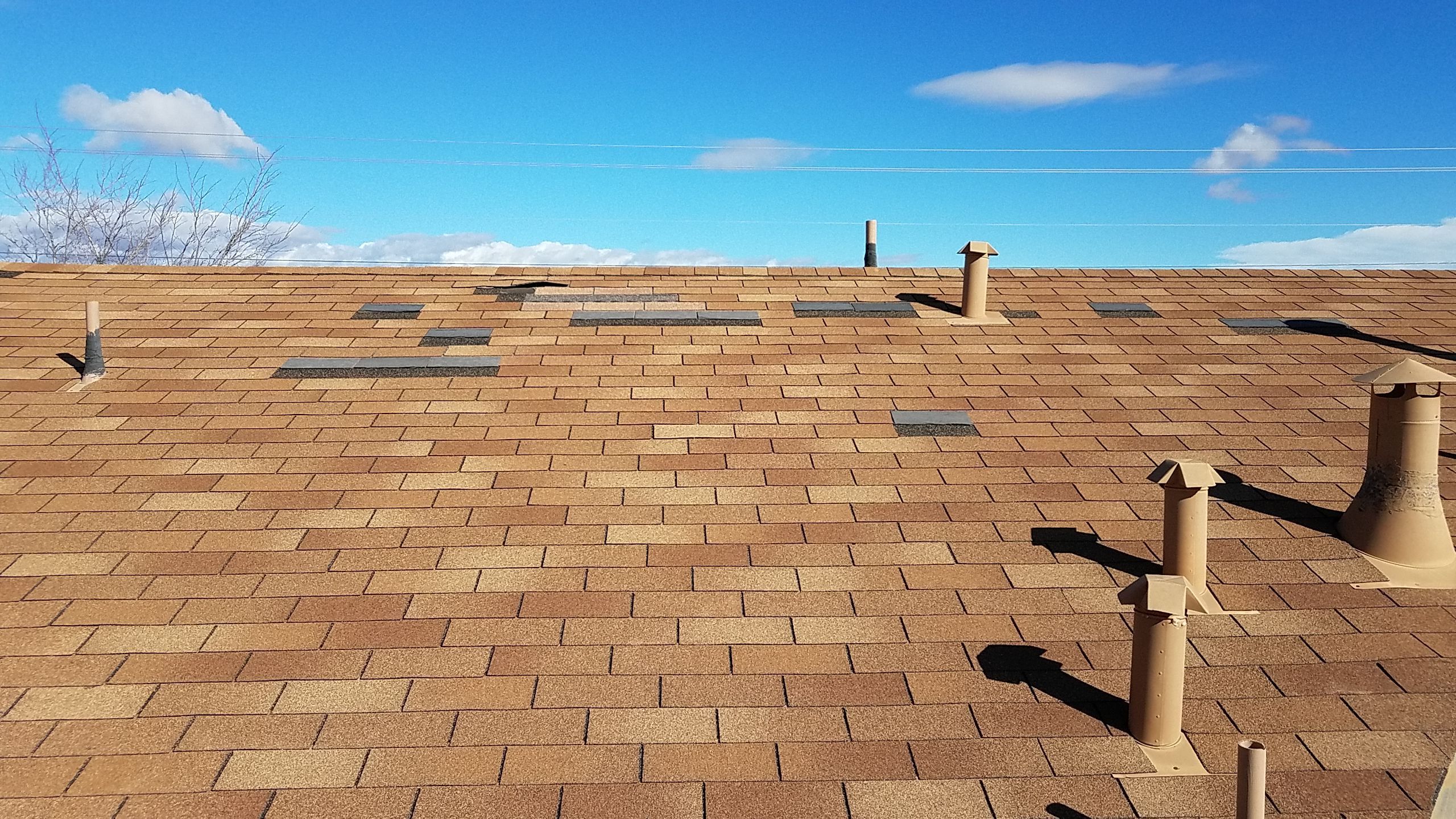 Wind damage repairs and maintenance in Rio Rancho by Doyle Roof Masters Inc