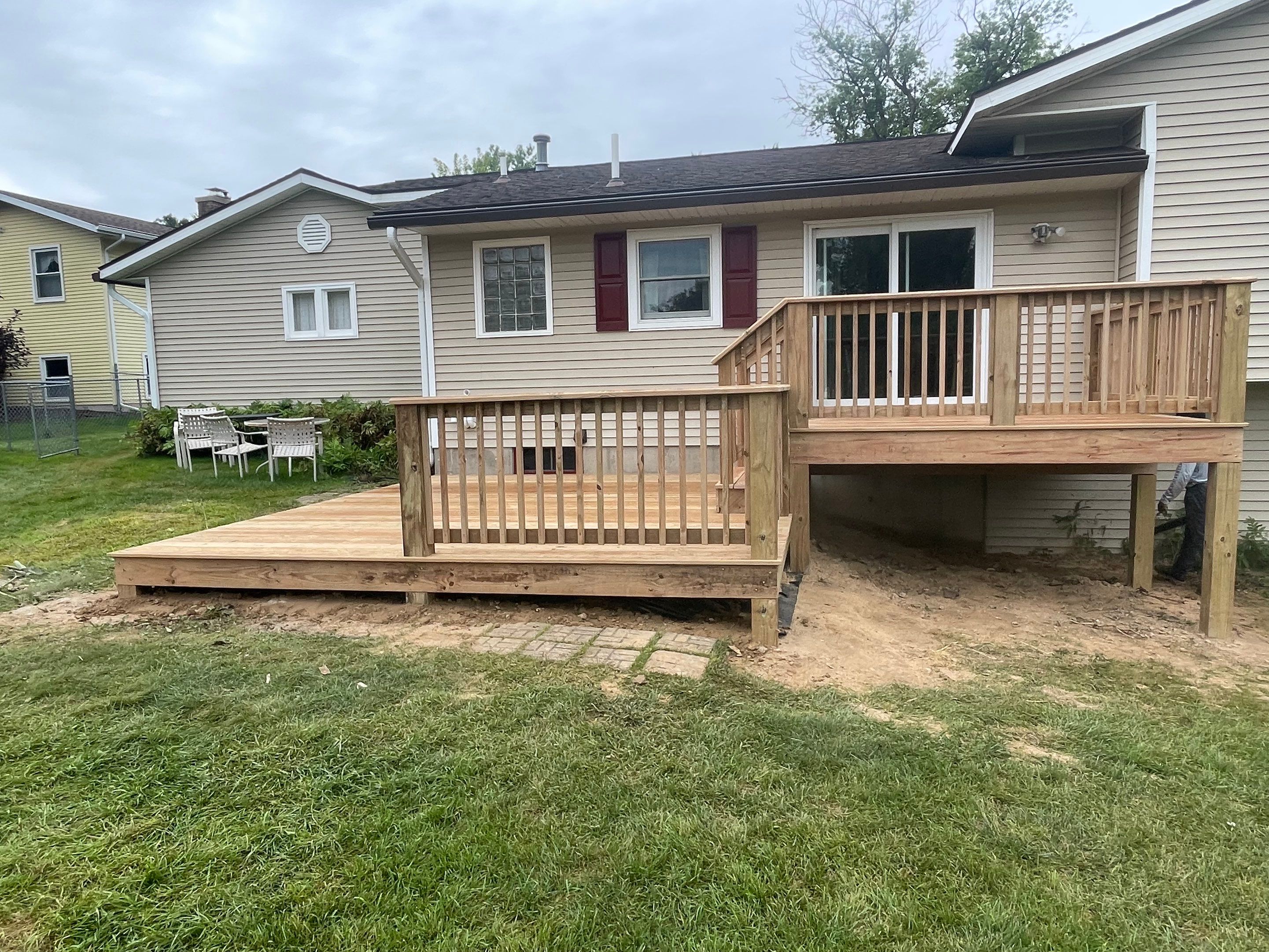Deck Installation using Treated Lumber by Avalon Roofing and Exteriors