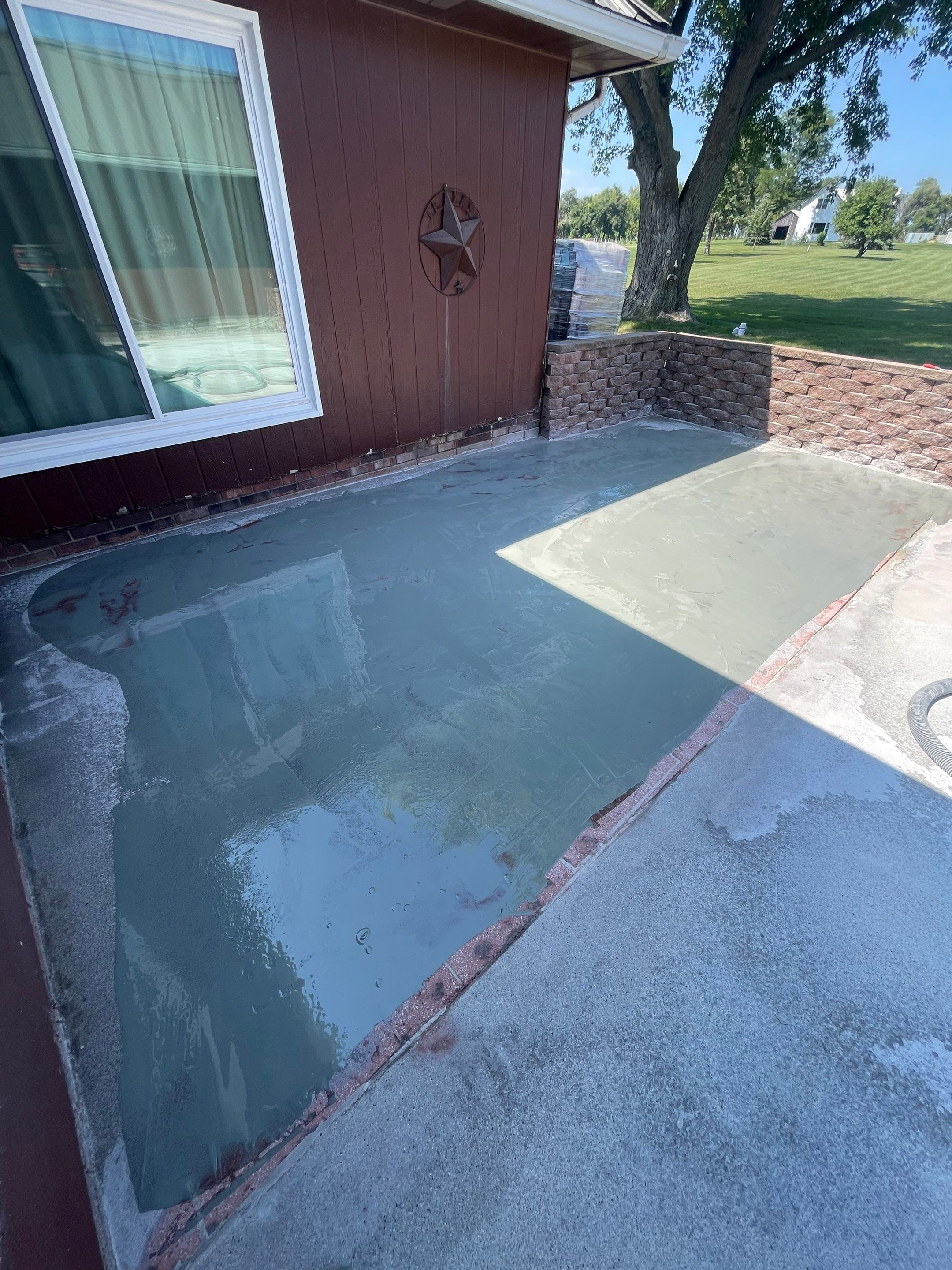 Concrete Patio Resurfacing and Protective Coating in Winfred, South Dakota by Select Painting, Coatings & Garage Cabinets