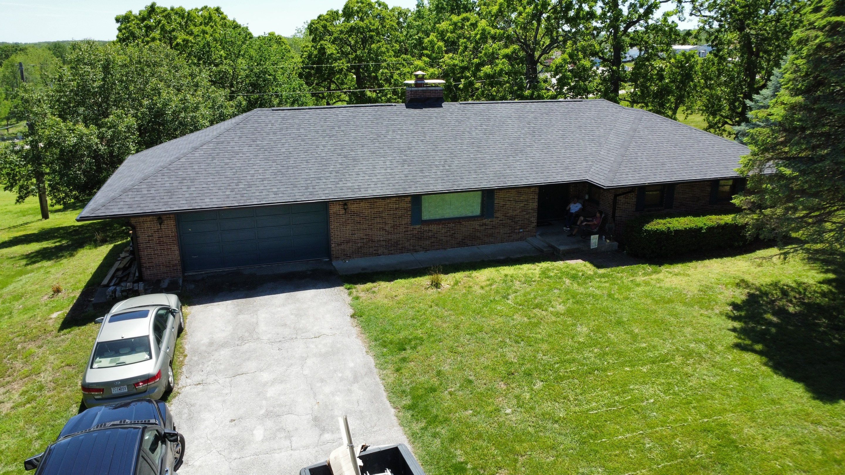 Residential Roof + Gutters & Downspouts & Gutter Guards Install  by Titan Commercial & Residential Roofing 