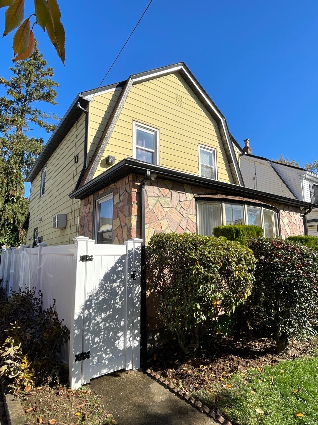 Full House Installation 5" black seamless gutters and 2x3 leaders using 5" black K style seamless gutters and 2x3 black leaders by Above All Gutters