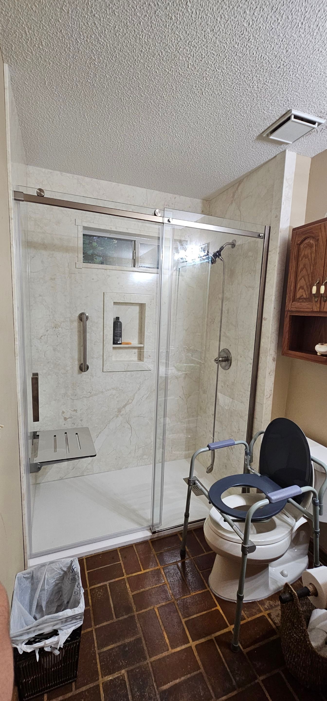 Sentrel Shower with window and ADA chair / ADA grab bar by Academy Construction