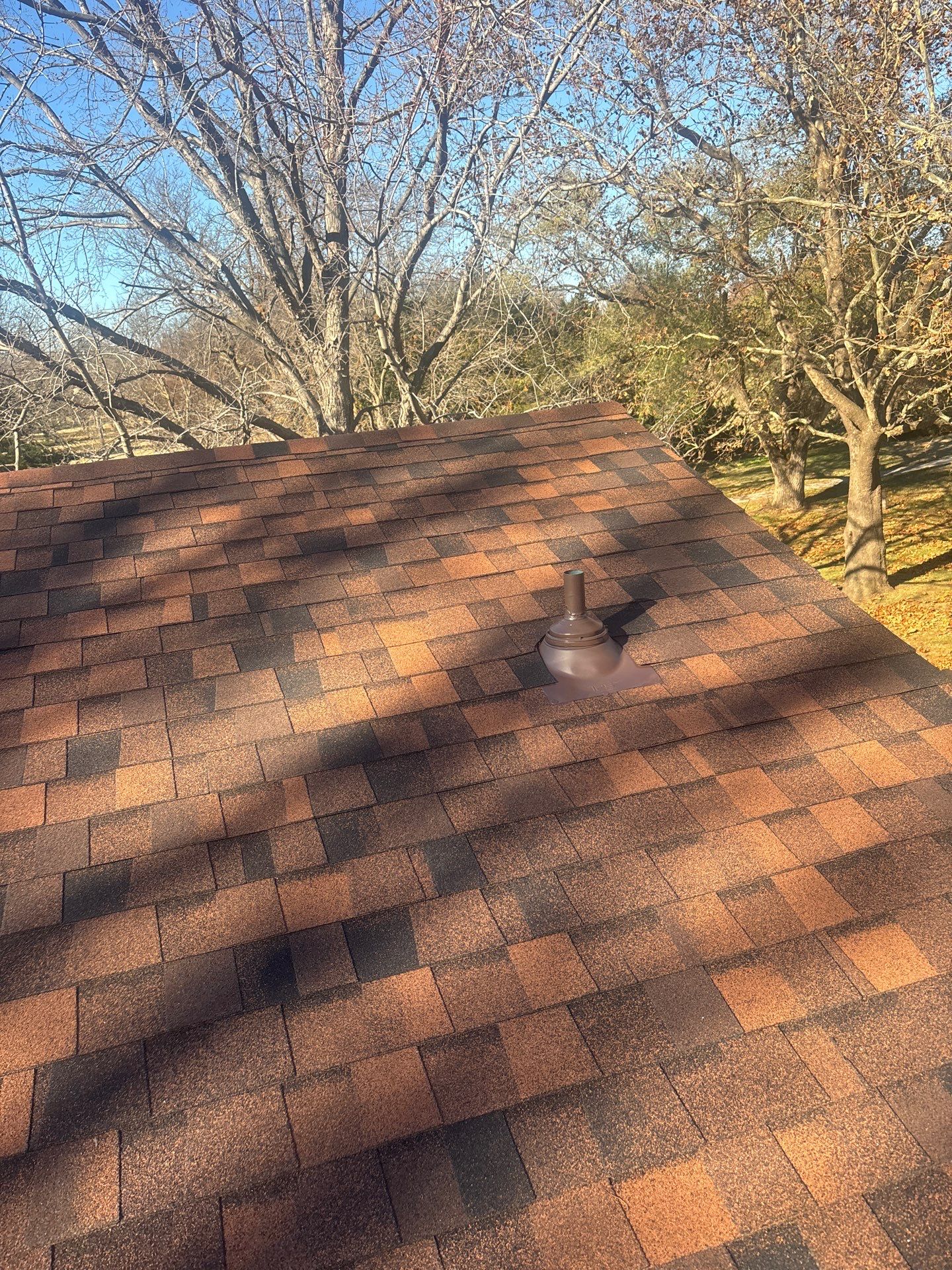 Storm Damaged Roof & Gutter Replacement by Eaton Roofing 