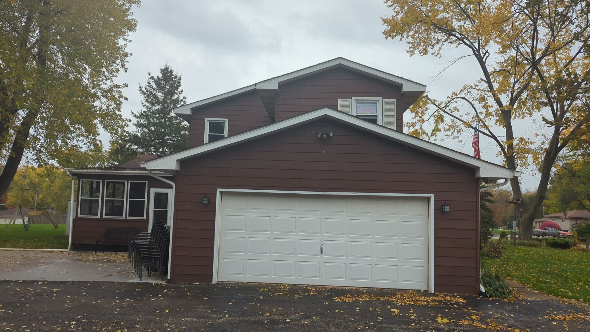 Vinyl siding replacement using CertainTeed Monogram double 5" vinyl siding  by AJ Exteriors & Roofing Inc.